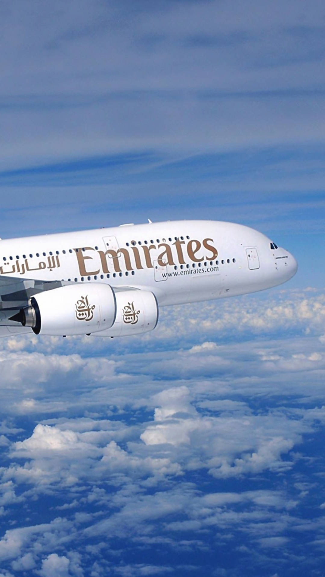 Emirates A380 Flying In Blue Sky