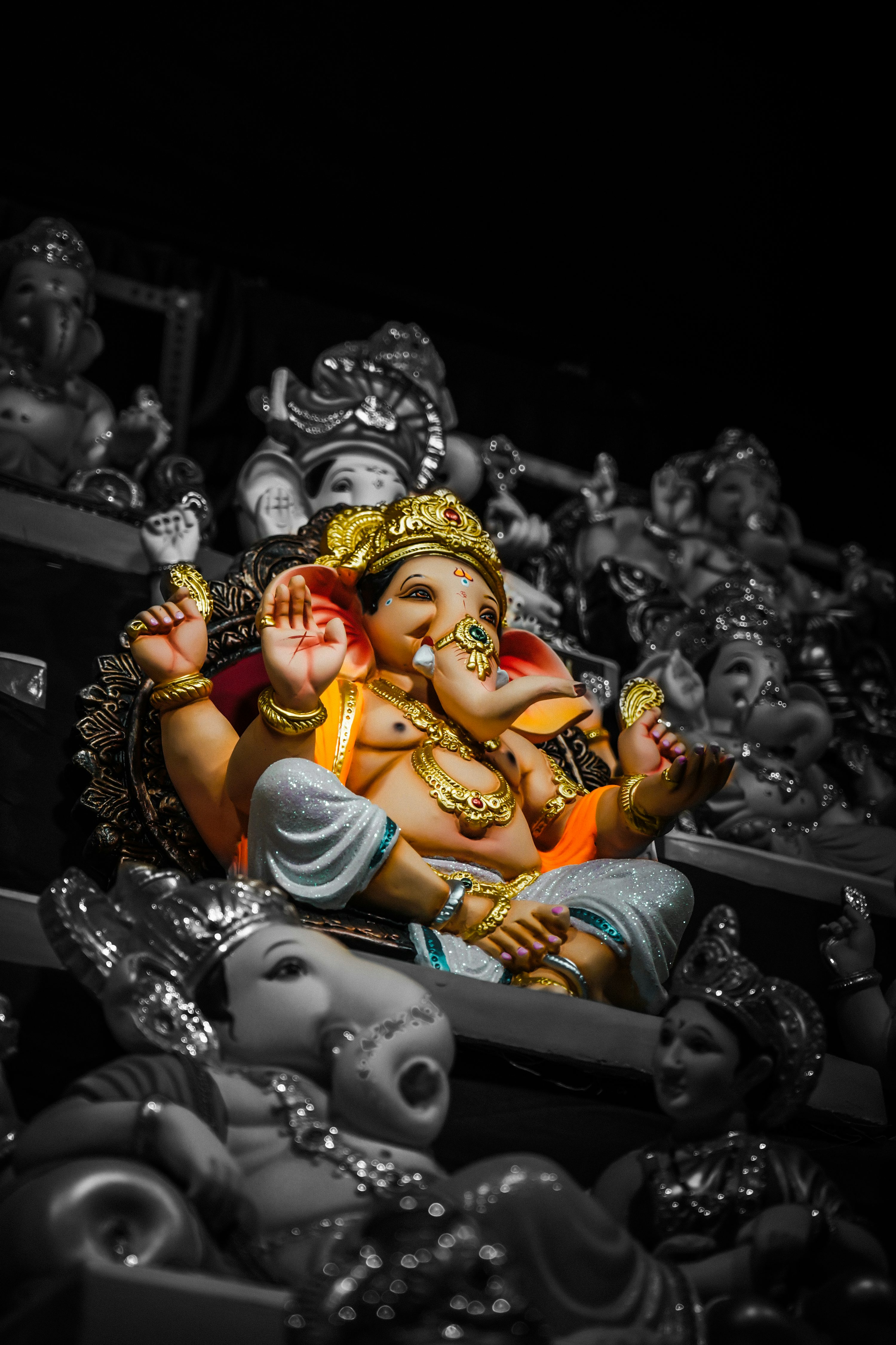 A statue of a hindu god in a black and white photo photo