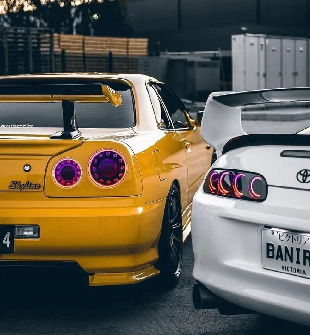 Nissan R34 Skyline GT R X Toyota Supra