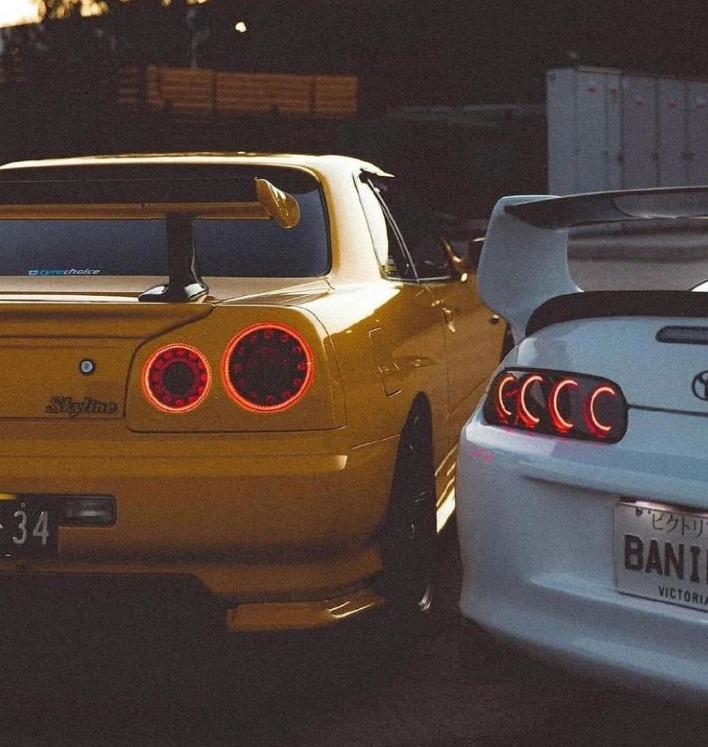 Nissan R34 Skyline GT R X Toyota Supra