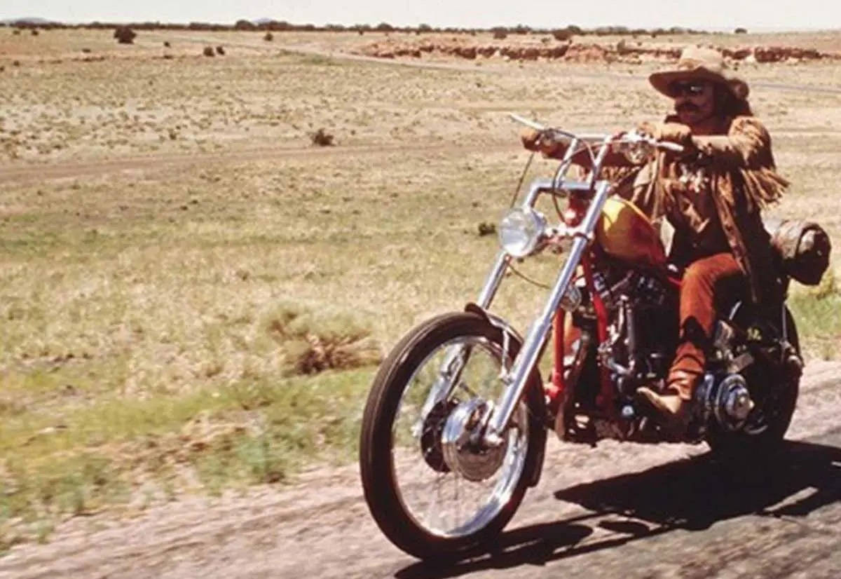 legendary Hollywood Actor Dennis Hopper In Classic Movie Scene From Easy Rider Wallpaper