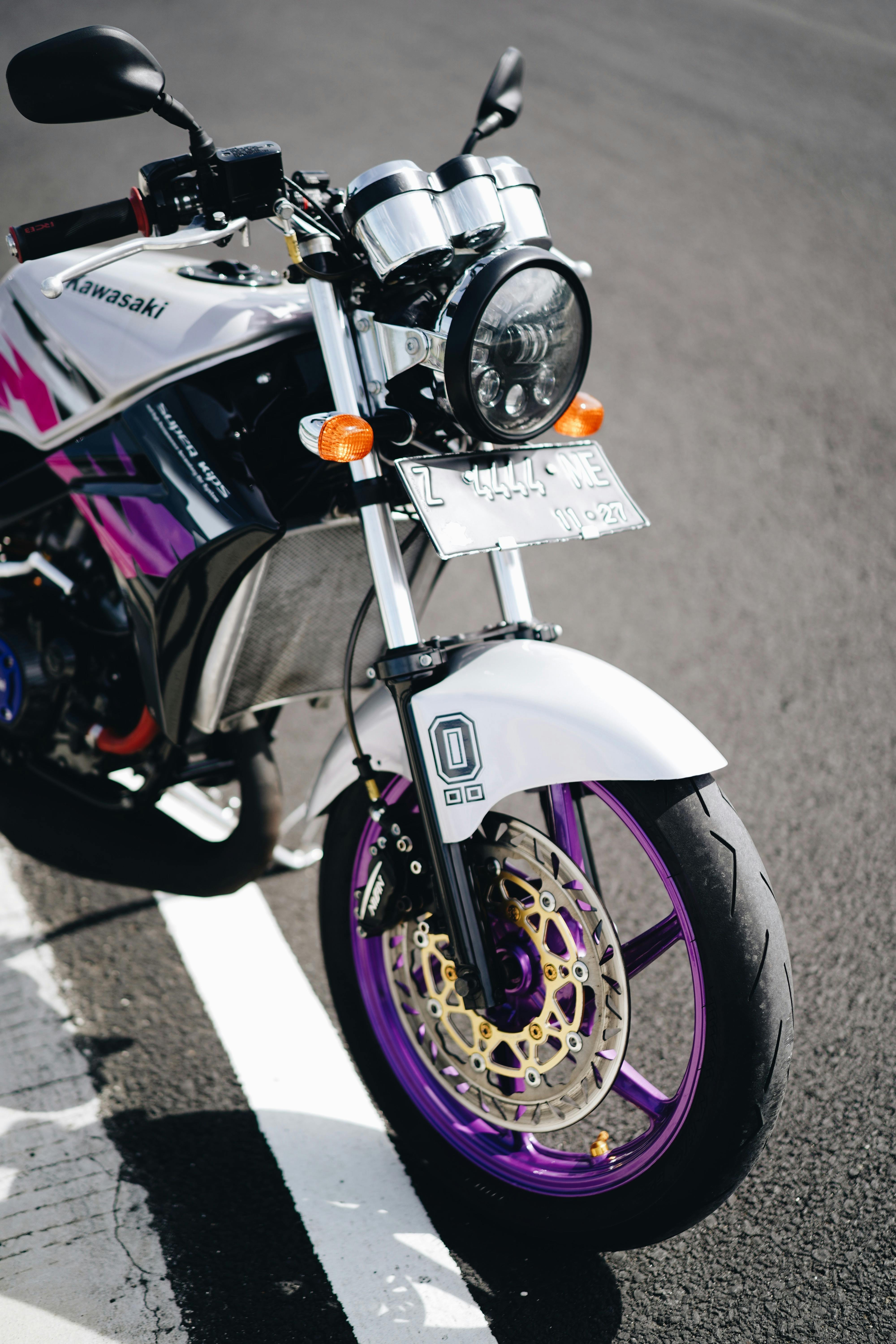 A Motorcycle Parked on a Street · Free