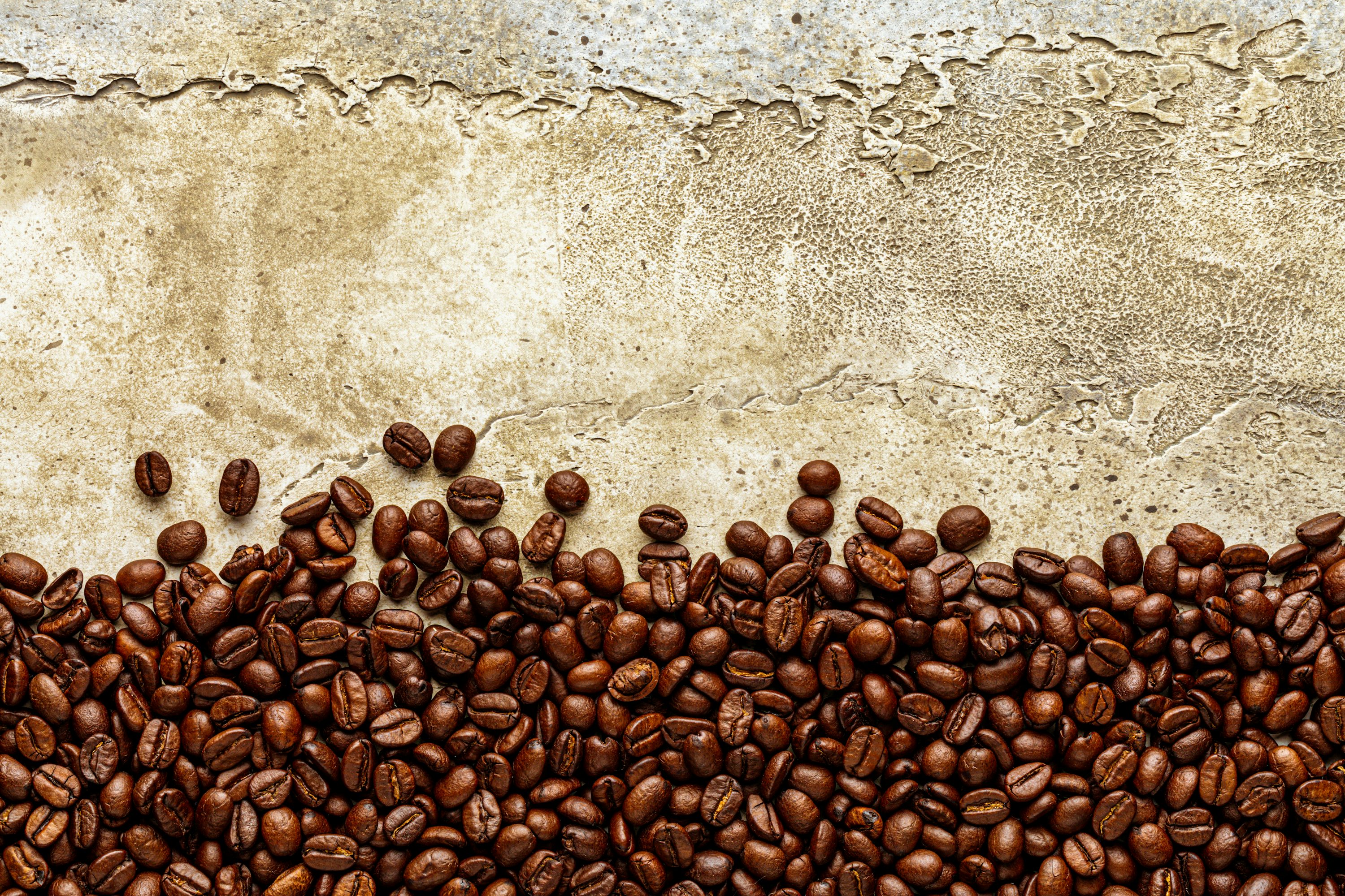 A group of coffee beans sitting on top of each other photo