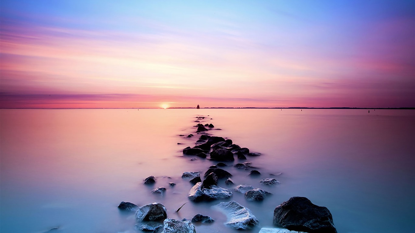 Beach reef ocean sunset glow skyline