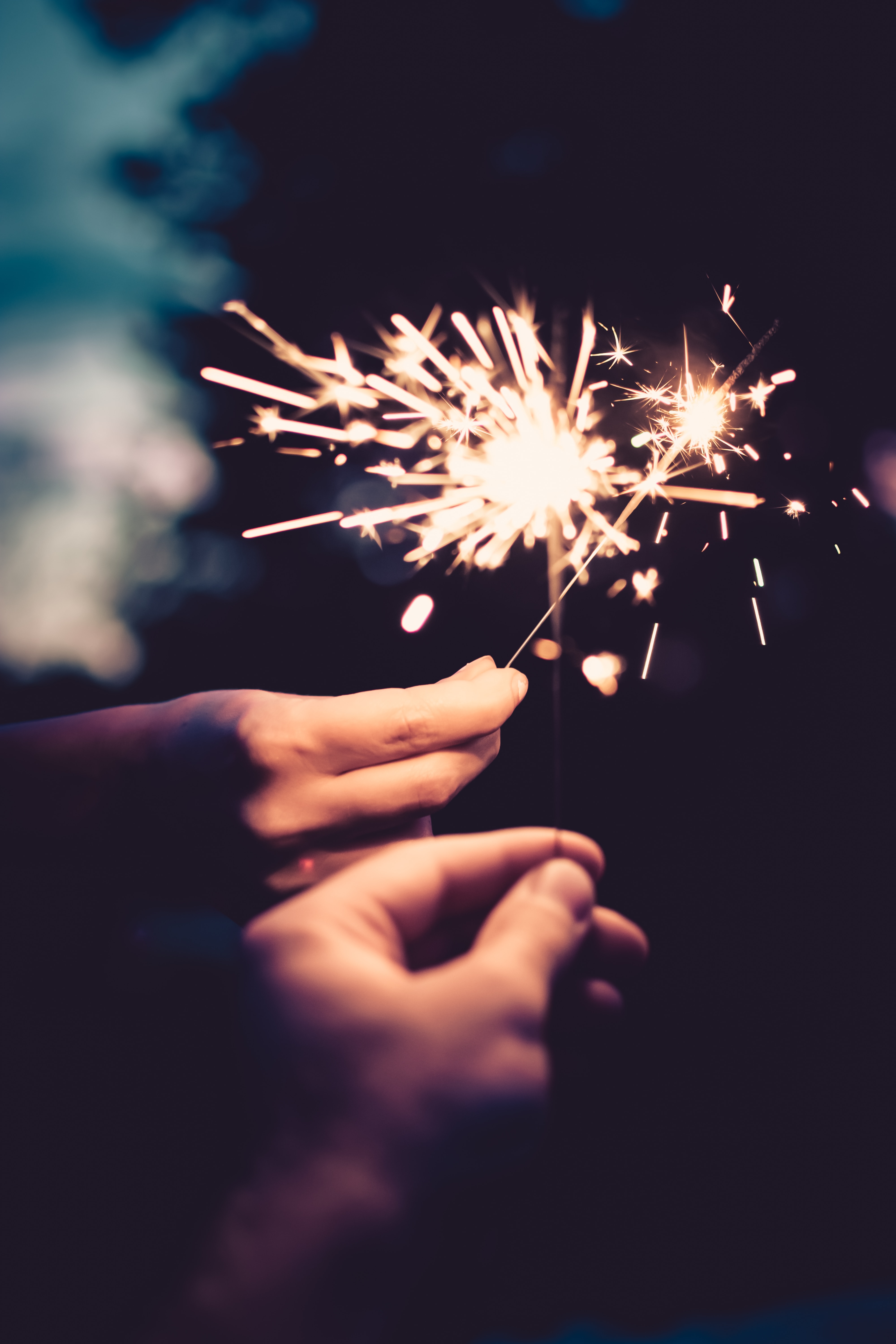 Bokeh sparkler wallpaper for iPhone