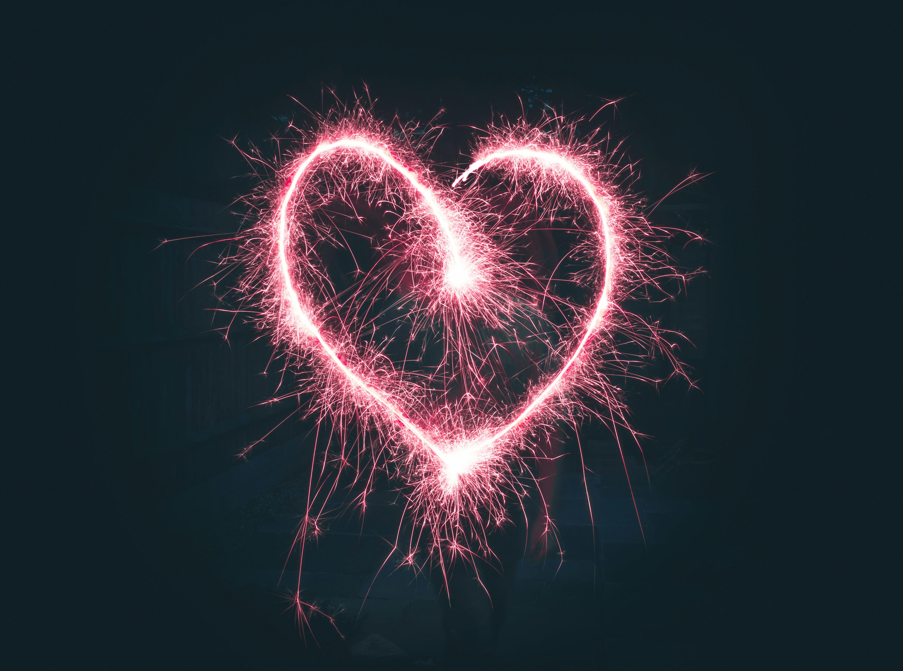 Heart shaped pink sparklers photography photo