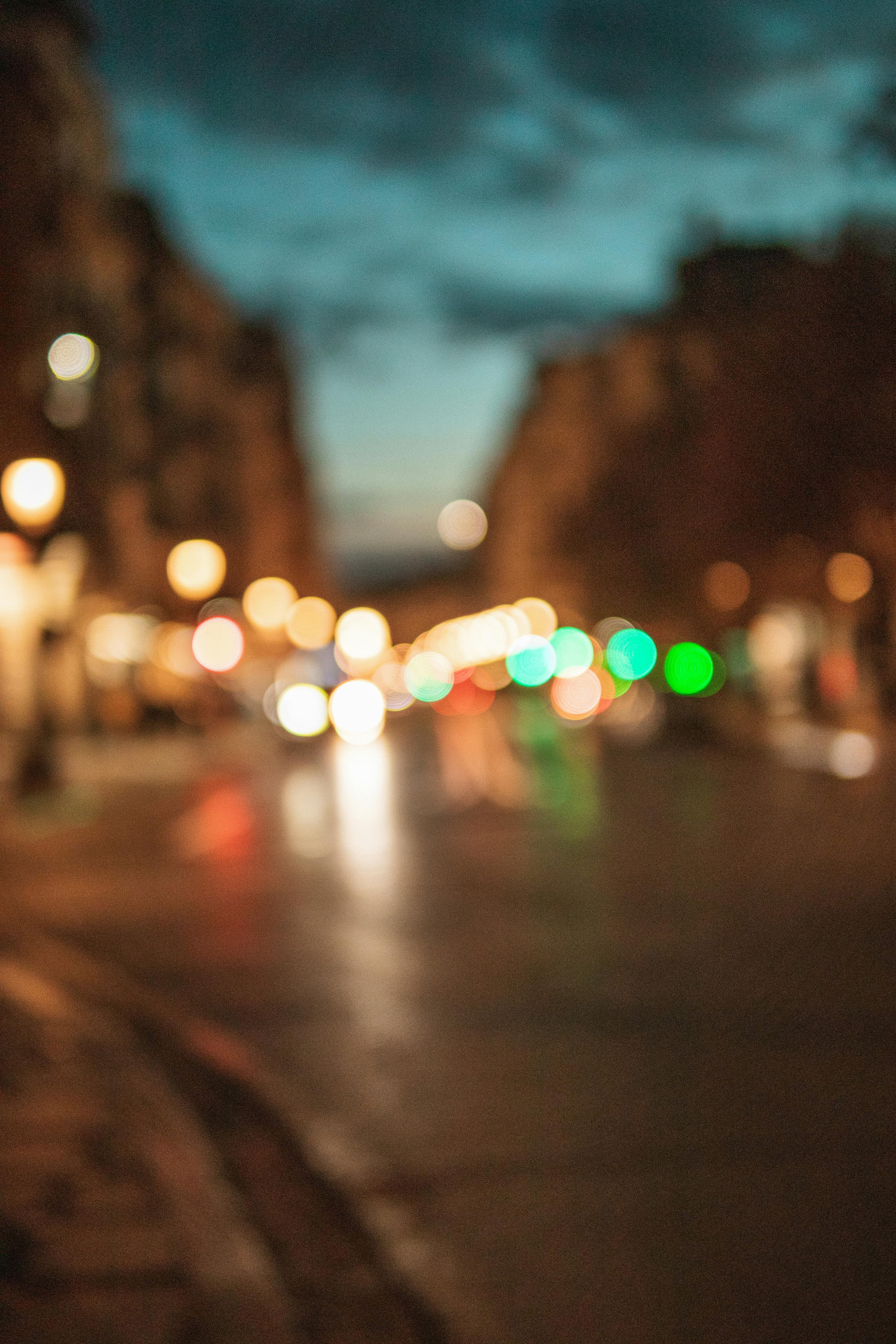 Blurred Lights on Street in Town at Dusk · Free