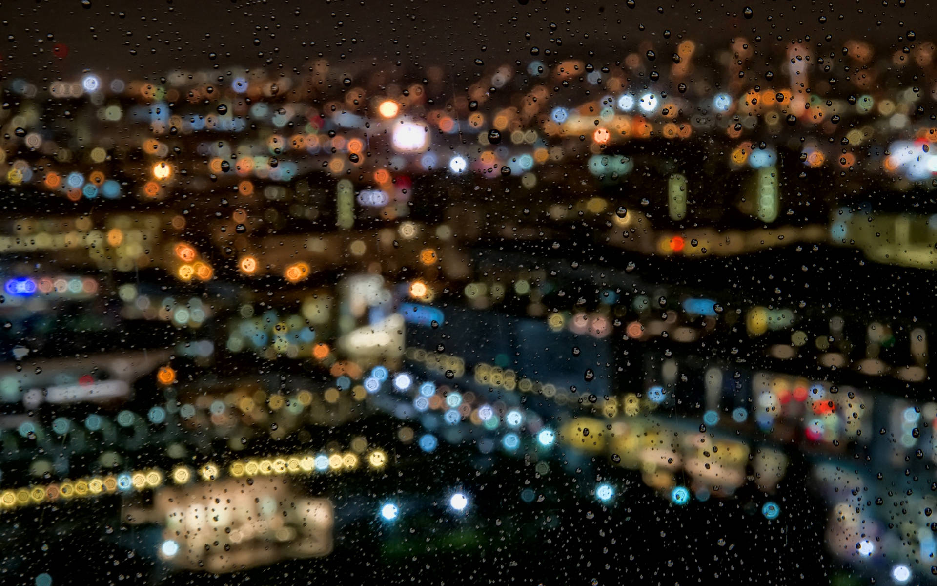 Download Blurry City View After The Rain Wallpaper