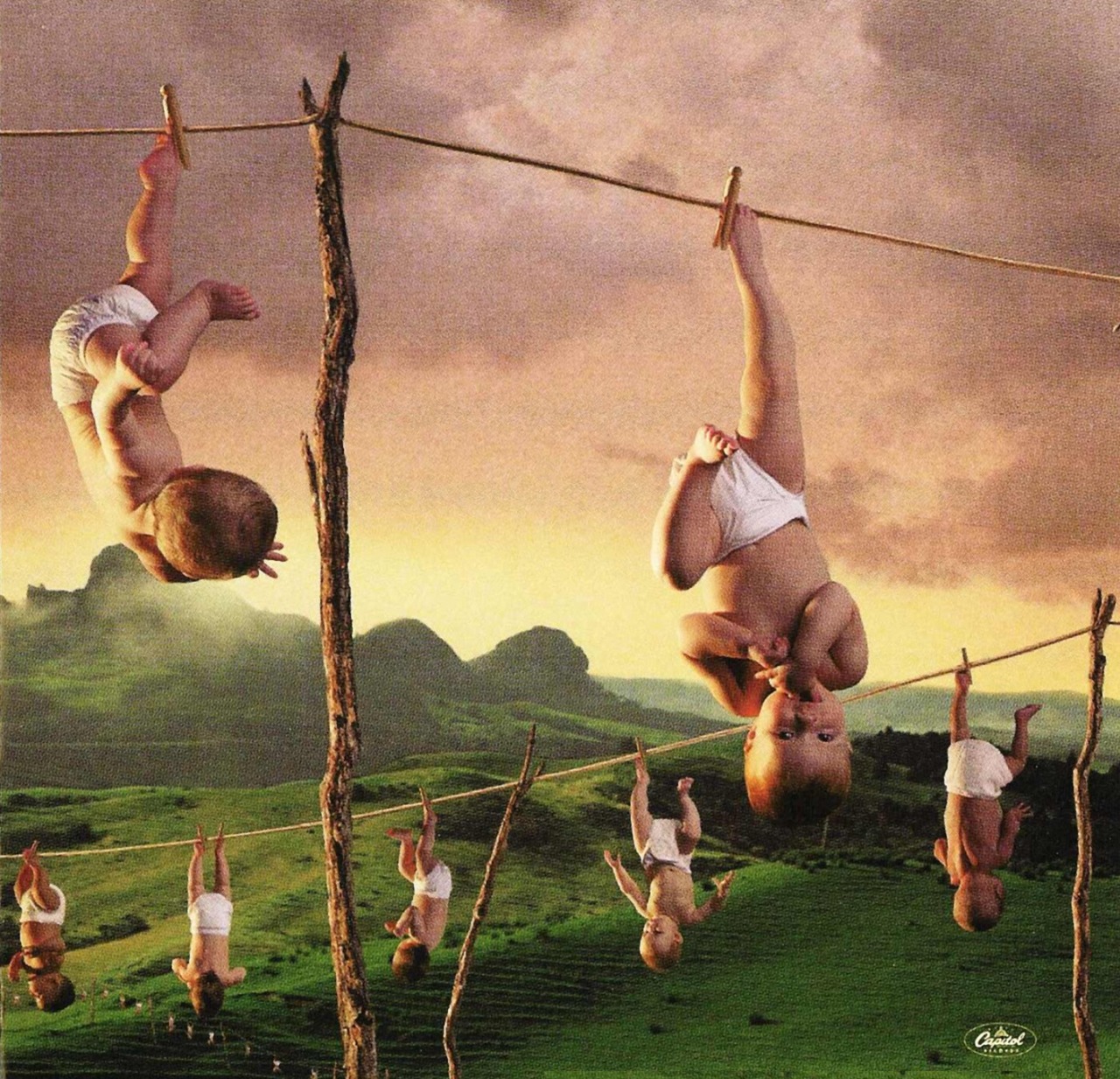 Youthanasia The cover art by Hugh Syme features an elderly woman hanging babies by their feet on a seemingly endless