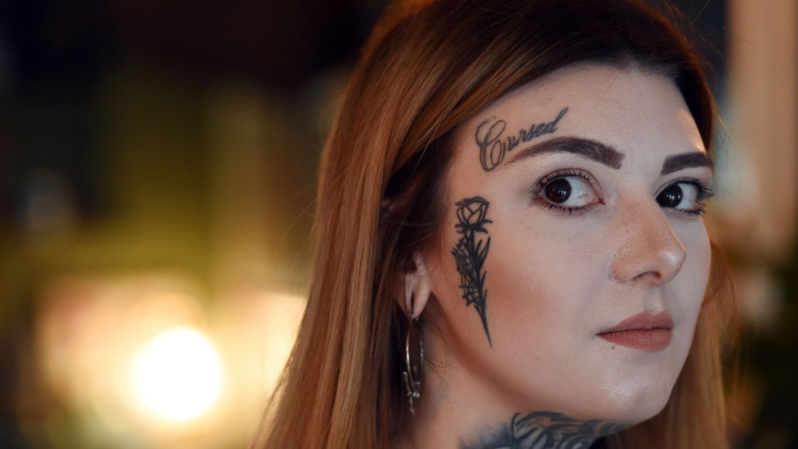 Woman tattoos her face to land her dream job. ITV News Central