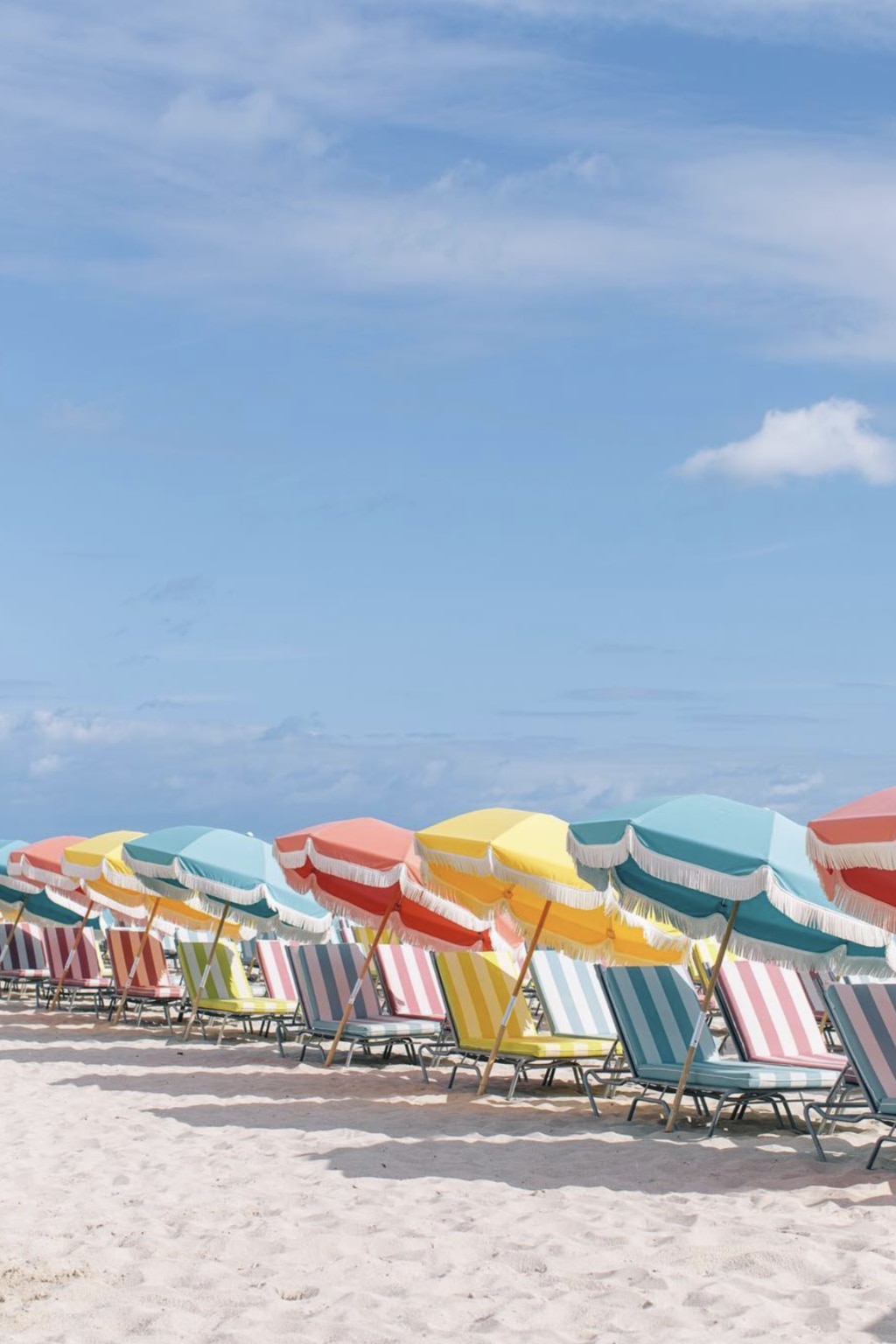 photo of beach umbrellas that will give you total travel envy