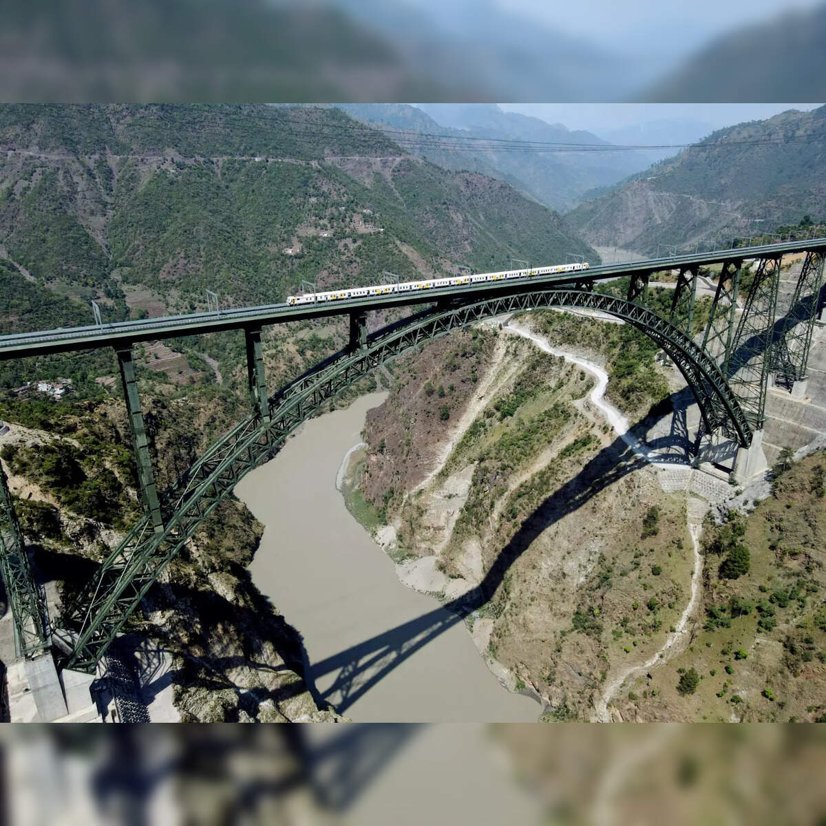 Chenab Bridge: Watch: Railways Conduct High Speed Trial On World's Tallest Chenab Rail Bridge. Goosebumps Guaranteed Economic Times
