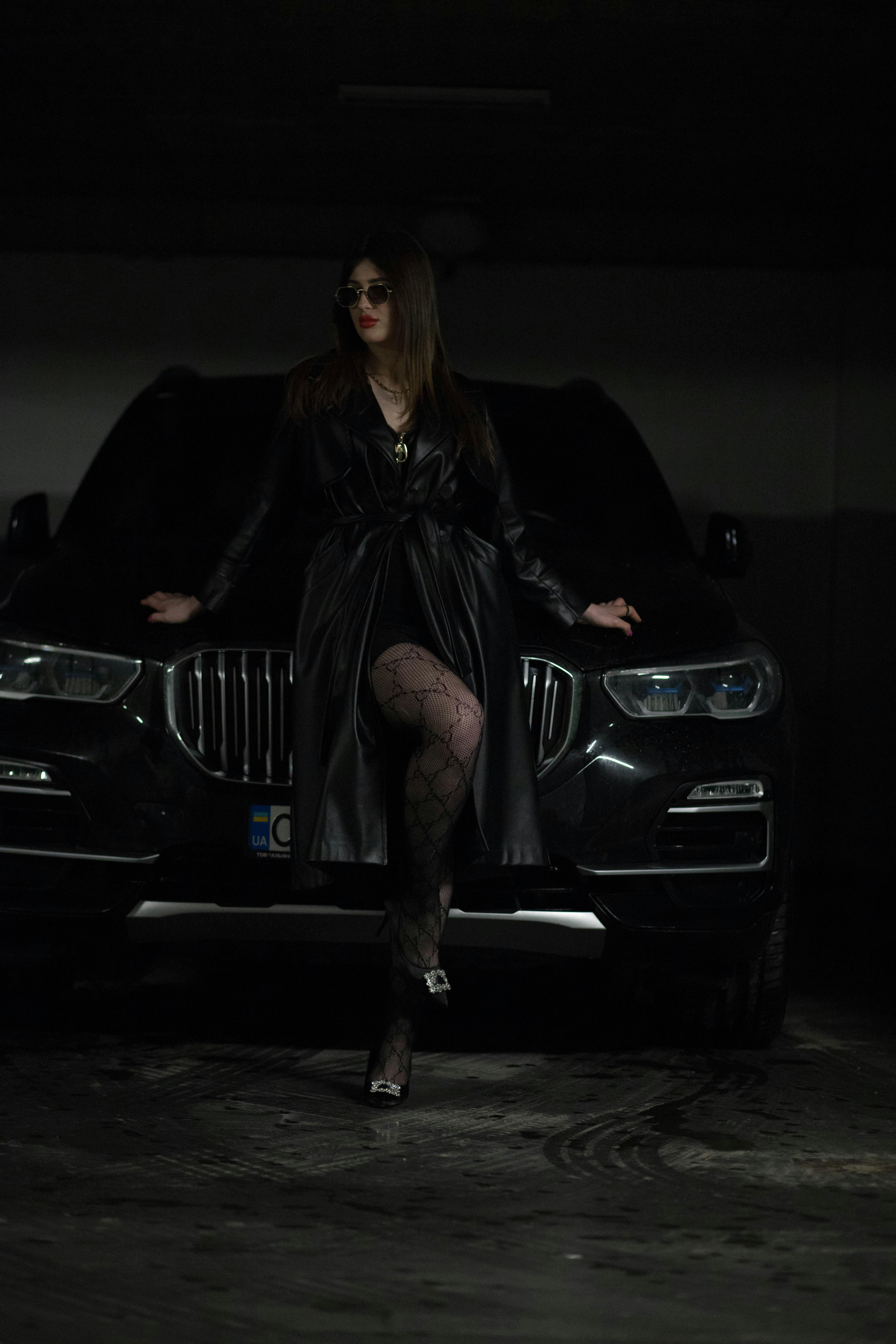 Woman with Black BMW · Free