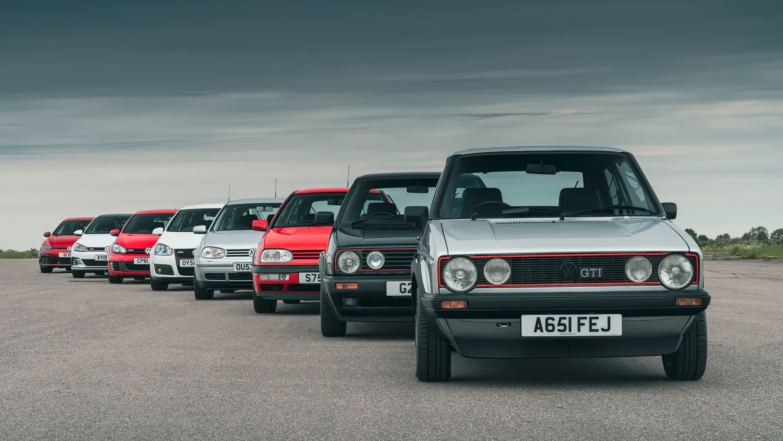 Have some wallpaper to share with you guys! All the generations of GTI's (AI Upscale)