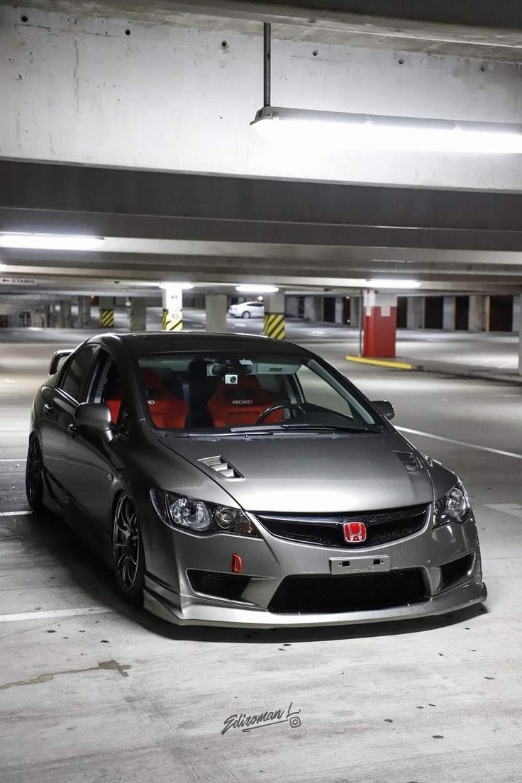 Silver Honda Civic Si Parked in Garage
