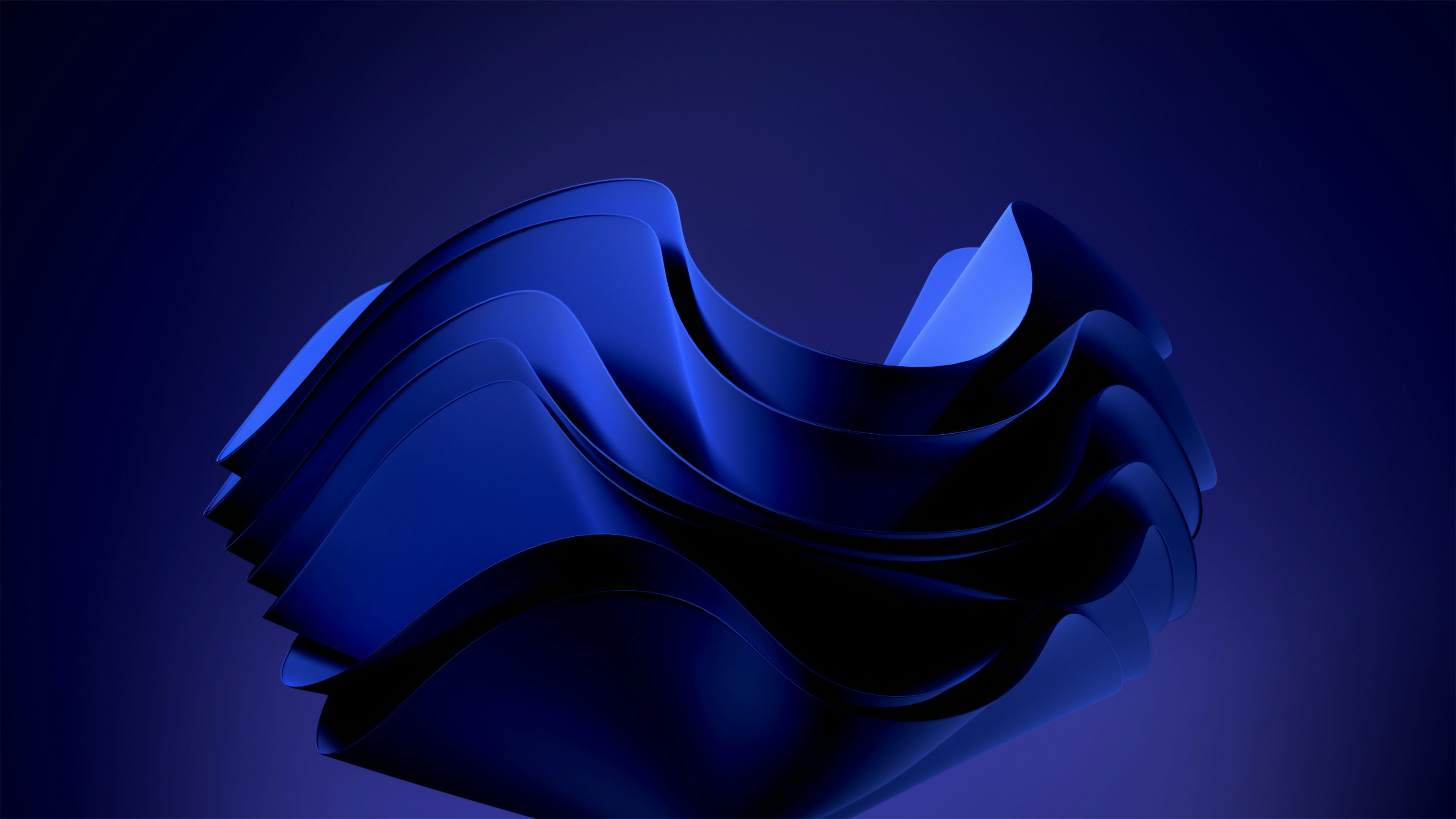 An abstract blue background with wavy shapes photo