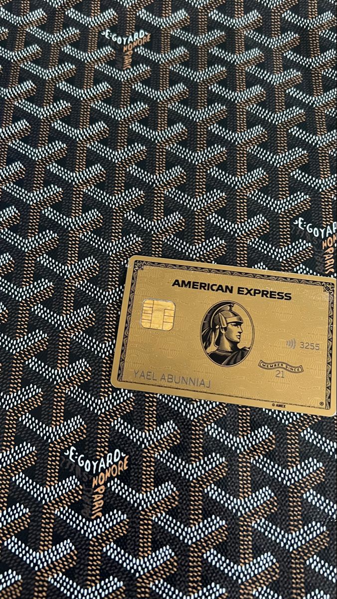 Elegant American Express Credit Card on Black and Gold Table Cloth