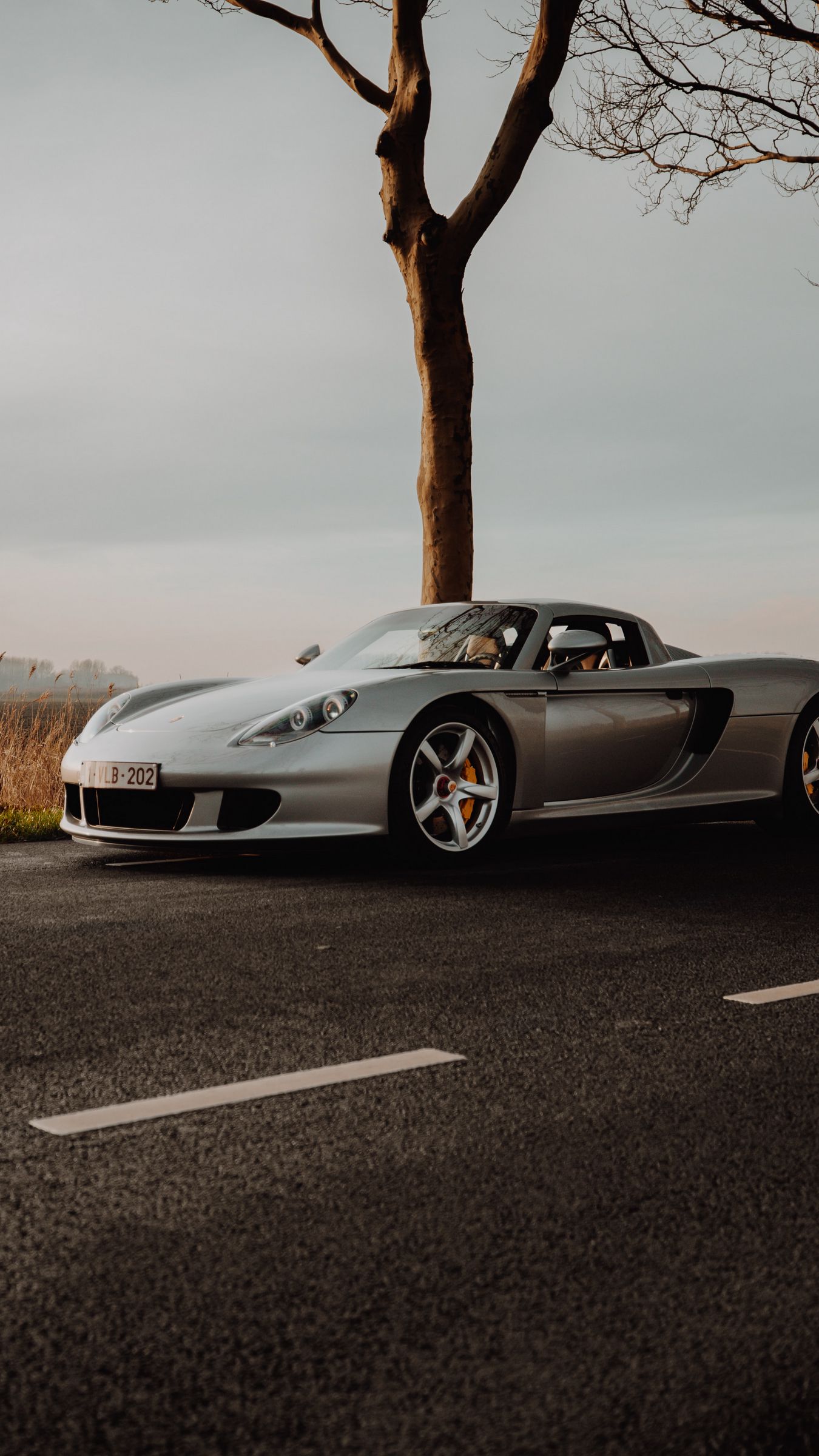 Download wallpaper 1350x2400 porsche 911, porsche, sports car, car, road iphone 8+/7+/6s+/for parallax HD background