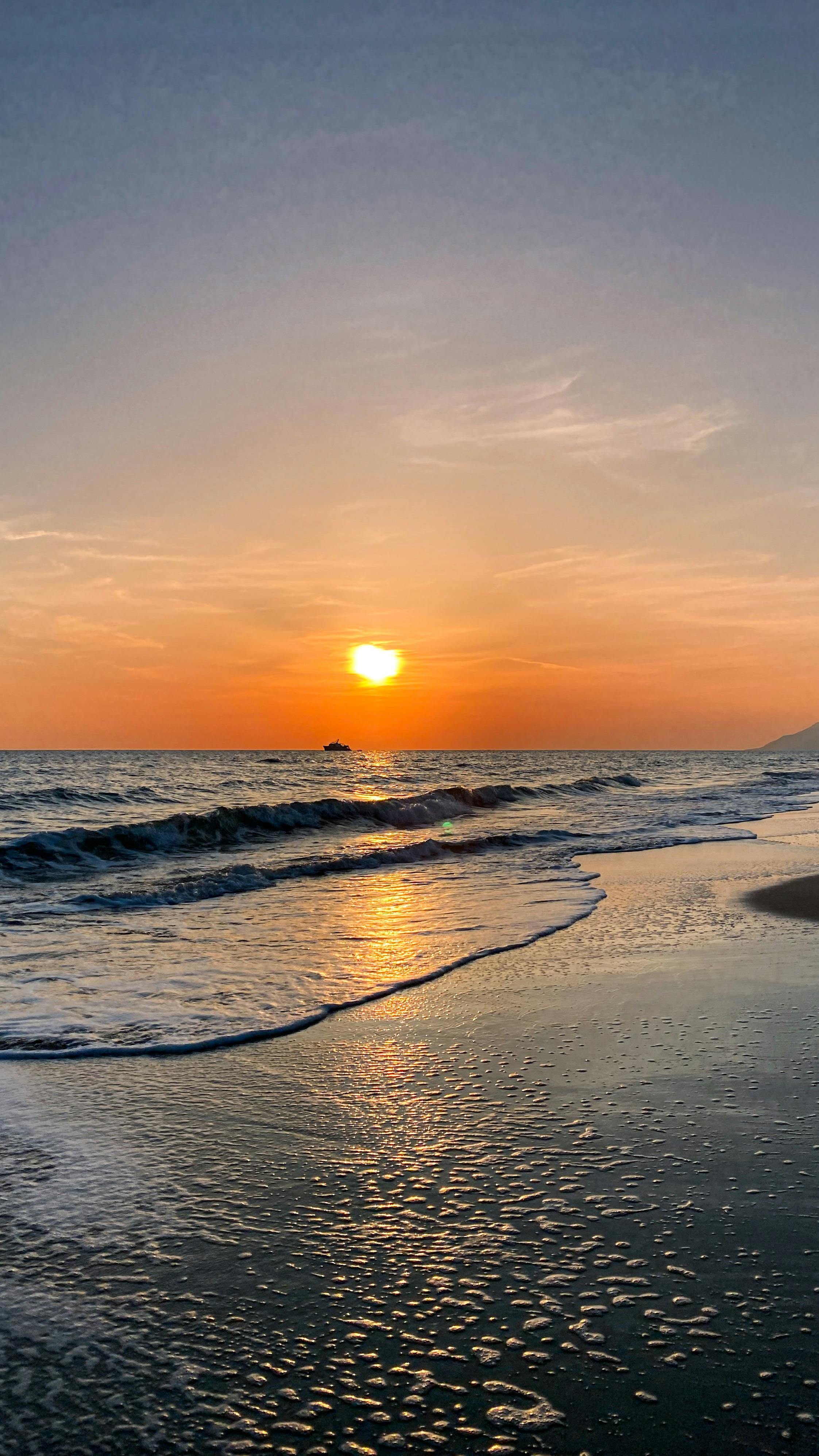 Sunset over Ocean Shore · Free