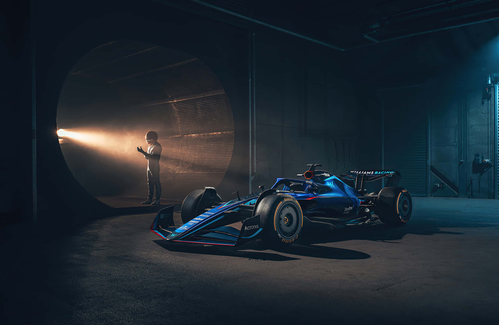 Download A Blue Racing Car In A Dark Tunnel Wallpaper