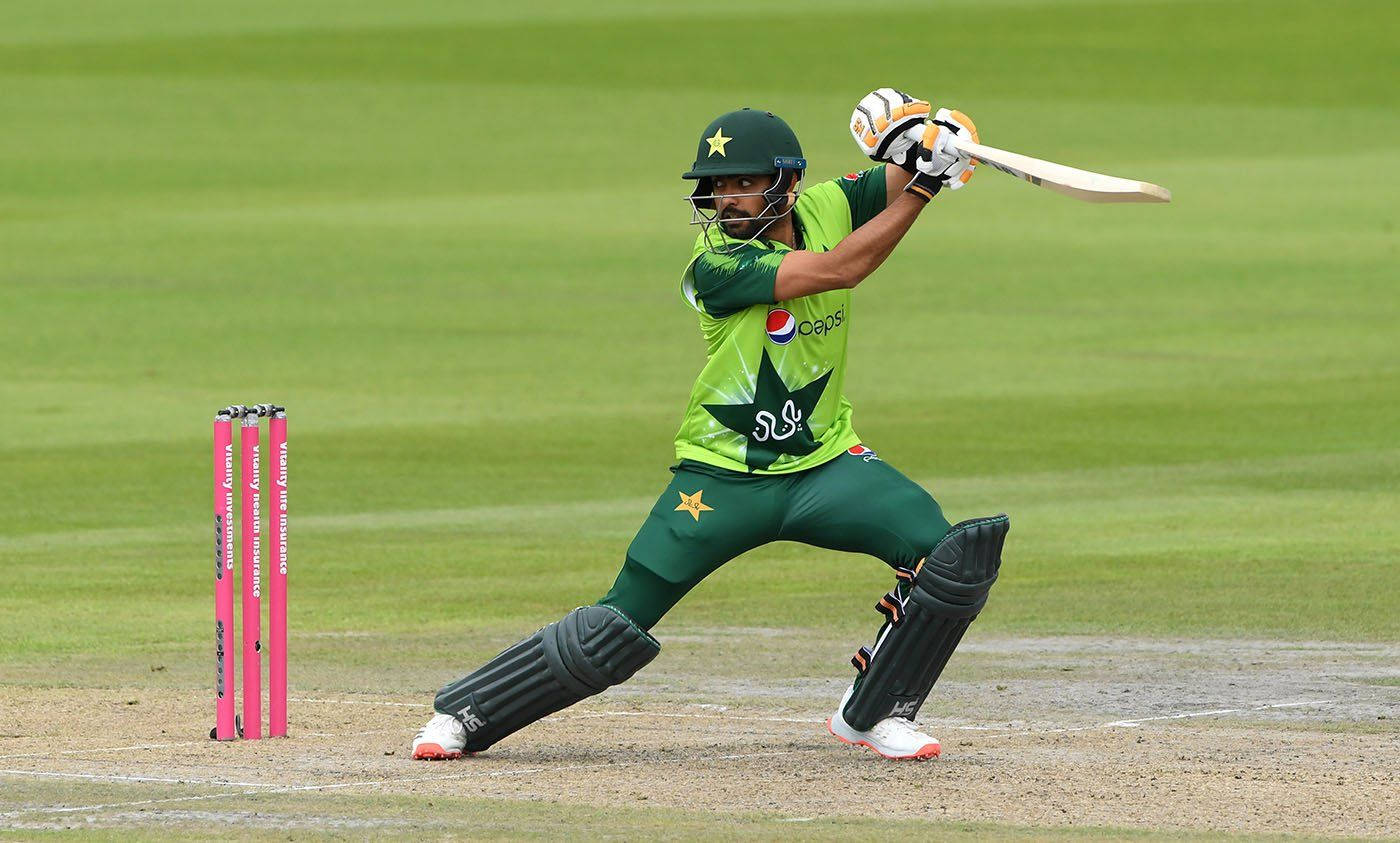 Download Babar Azam In Green Pepsi Uniform Wallpaper