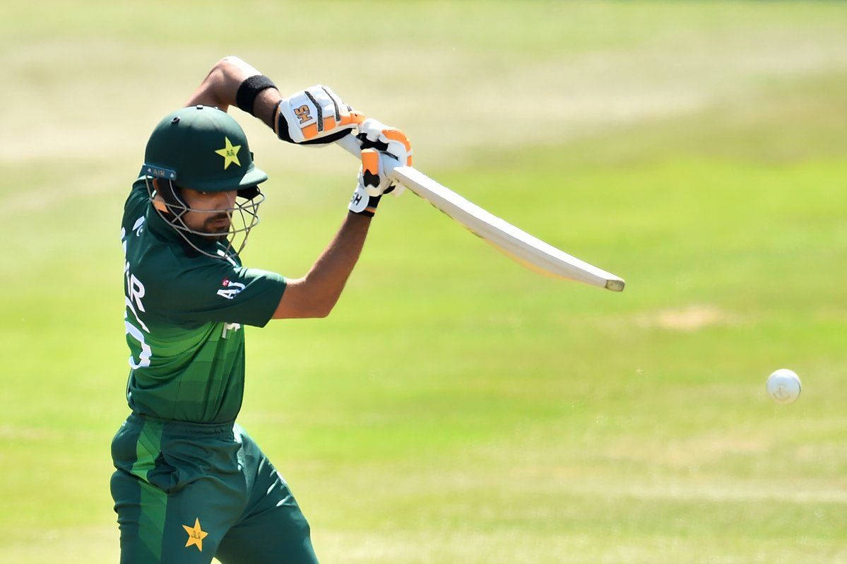 Download Talented Cricketer Babar Azam In Action Wallpaper