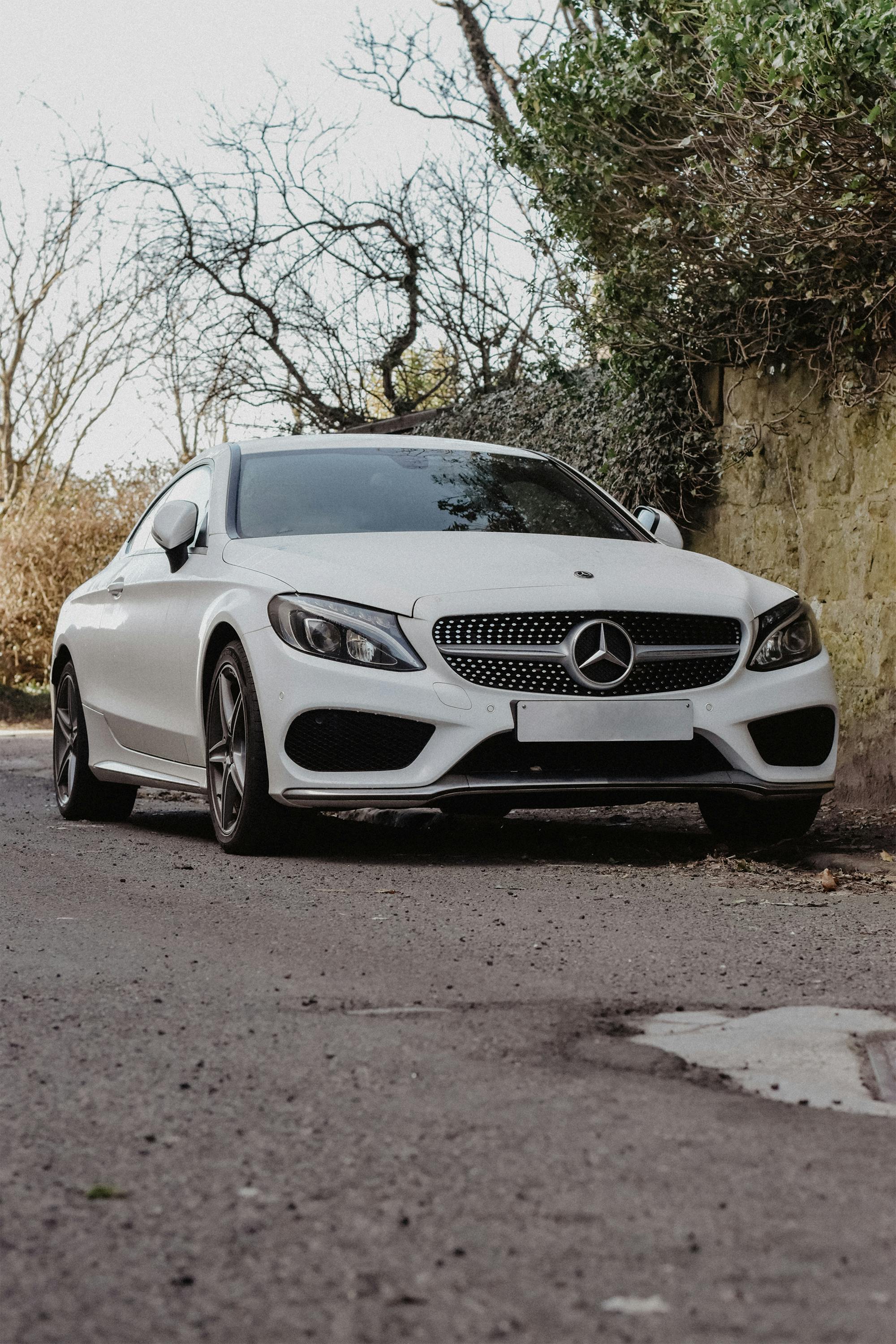 White Mercedes Benz Coupe Parked · Free