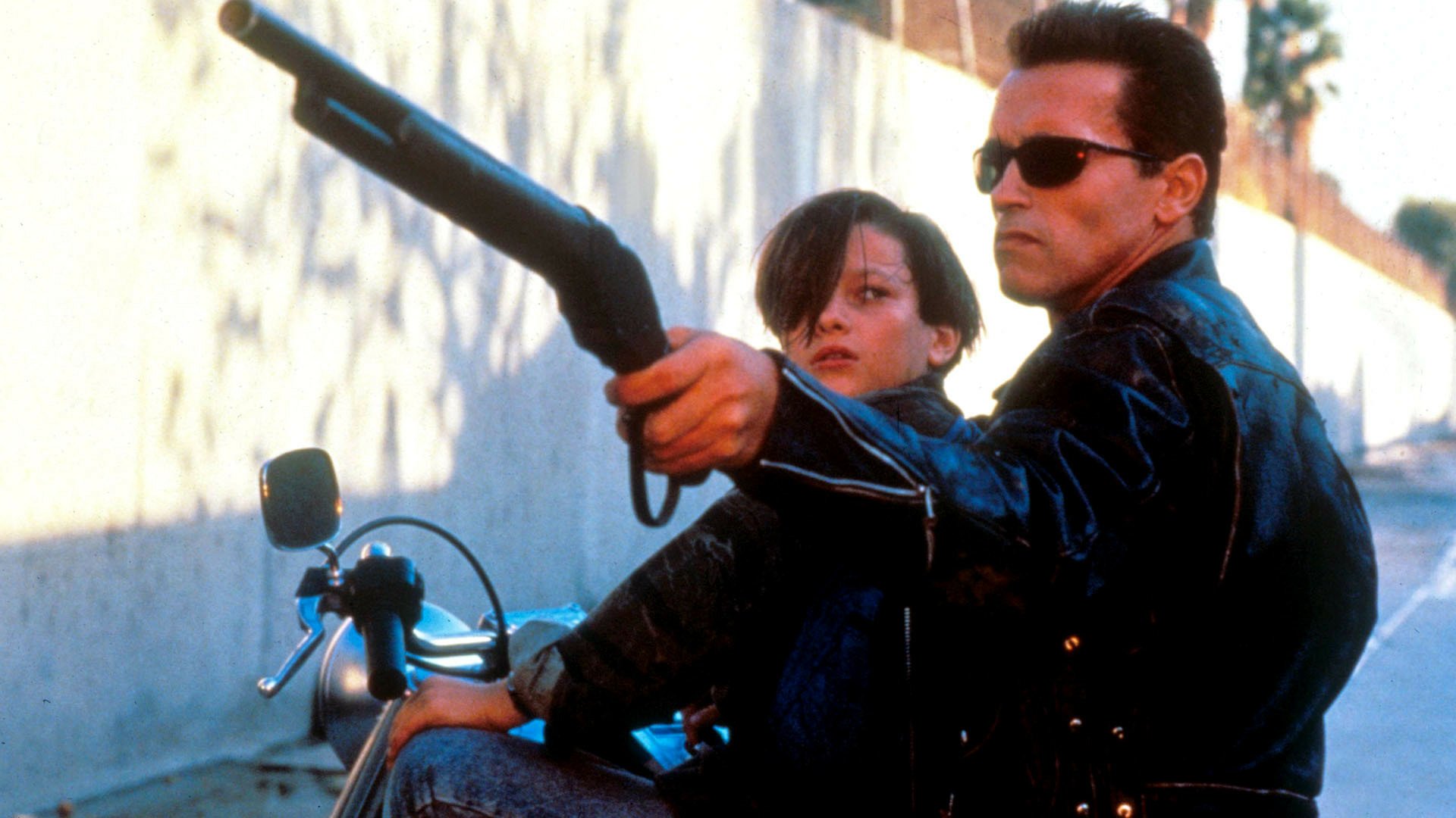 Terminator 2: Judgment Day HD Wallpaper Featuring John Connor And The T 800