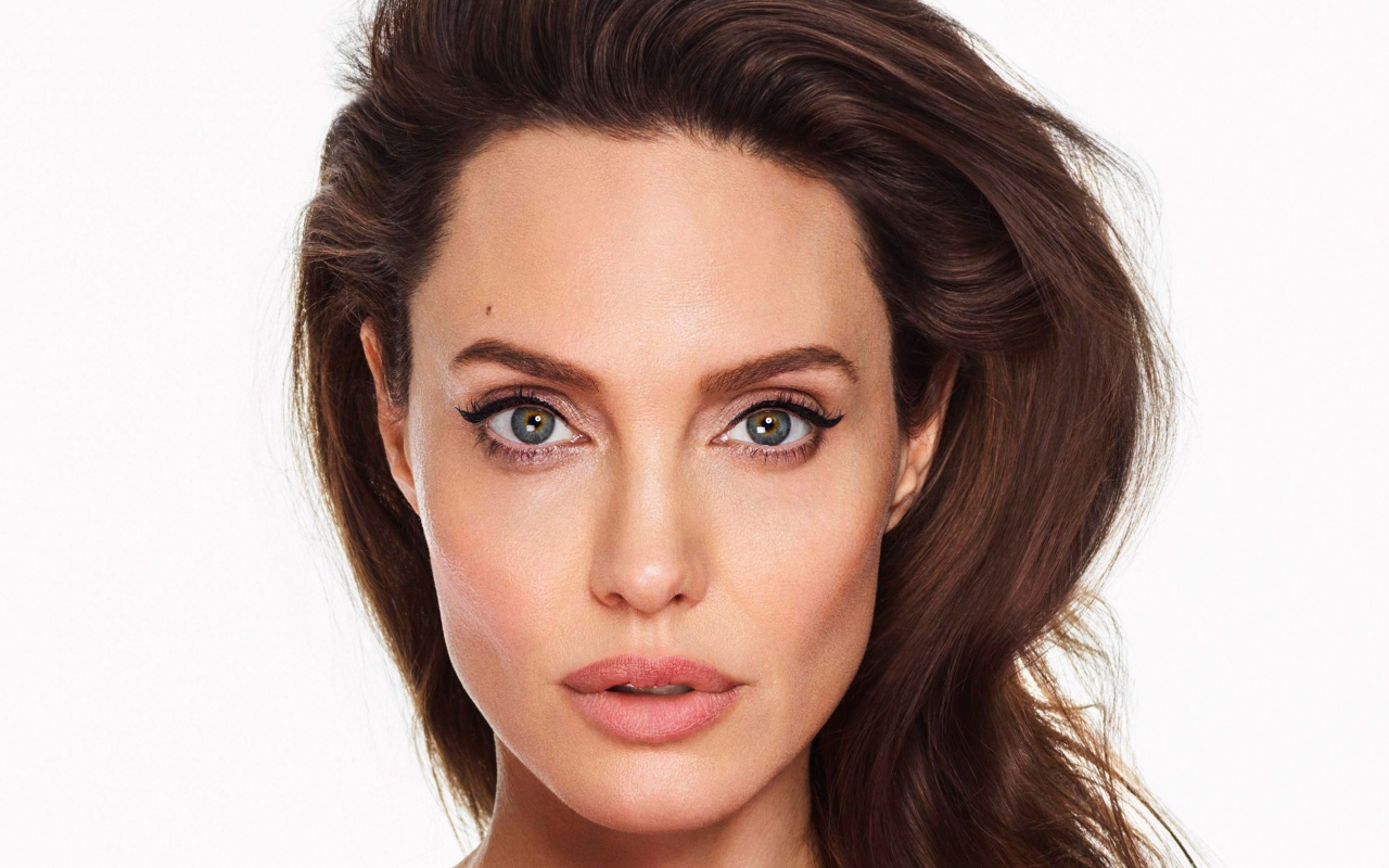 Popular actress Angelina Jolie face close up on a white background Desktop wallpaper 1280x800
