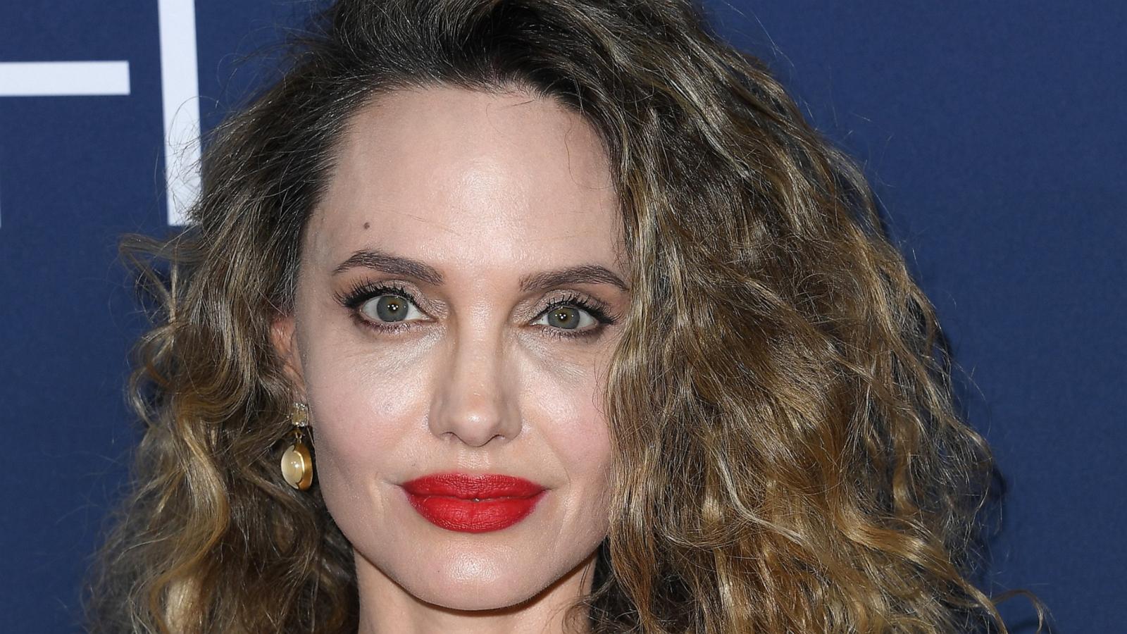Angelina Jolie stuns with rare red carpet curls for 'Maria' premiere
