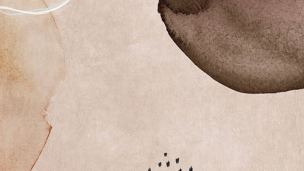 Download Cozy Brown Aesthetic Laptop Workspace with Botanical Elements Wallpaper