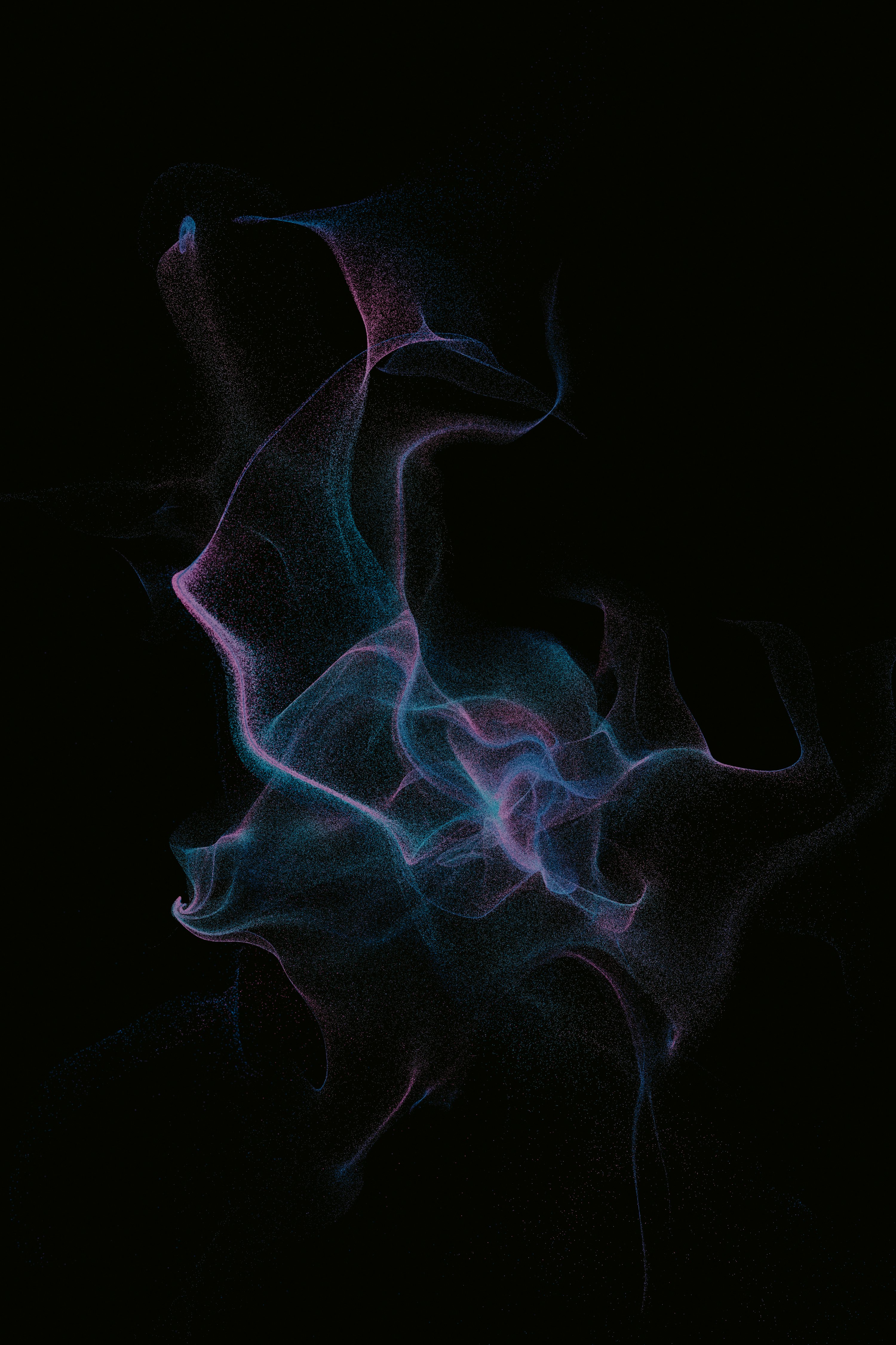 A black background with blue and pink smoke photo