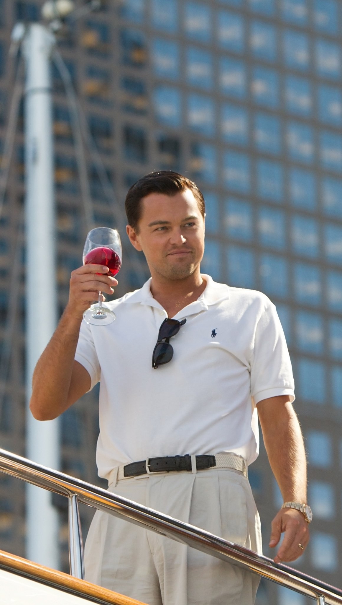 The Wolf of Wall Street with a glass of wine Wallpaper for iPhone and Mobile Phone