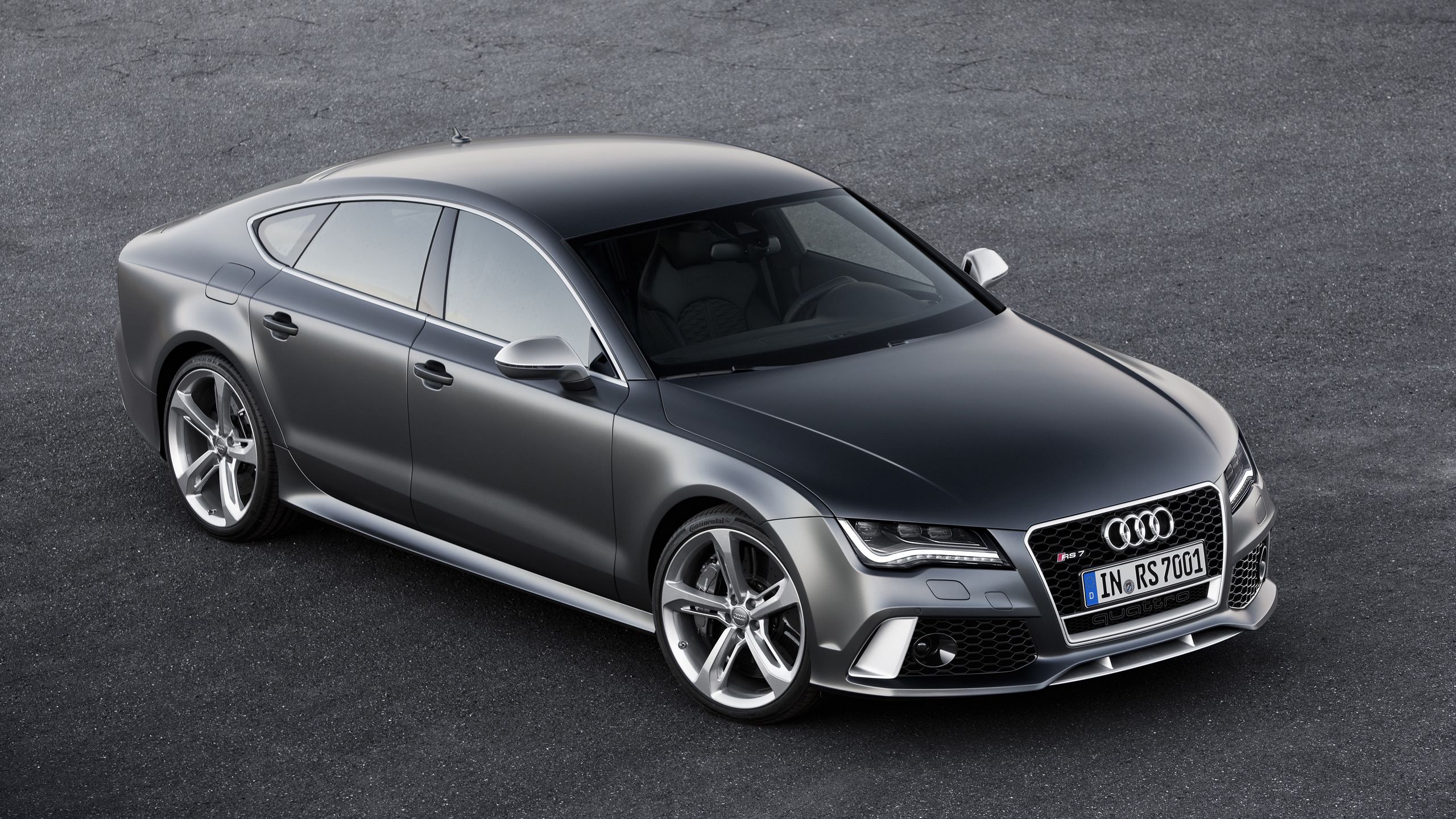 Download wallpaper 2560x1440 audi, rs7, black, side view widescreen 16:9 HD background
