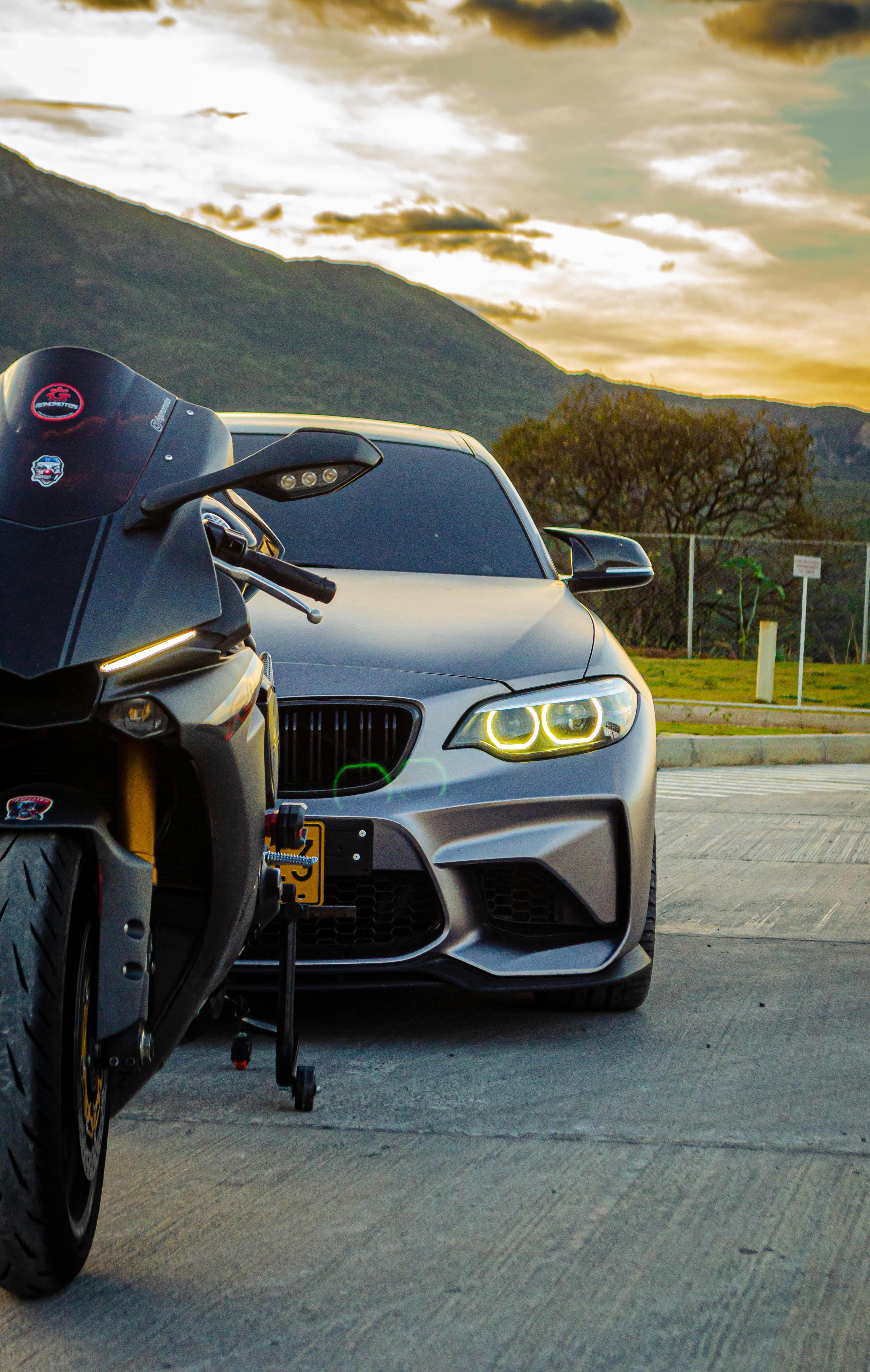 Motorbike and Silver BMW M2 · Free