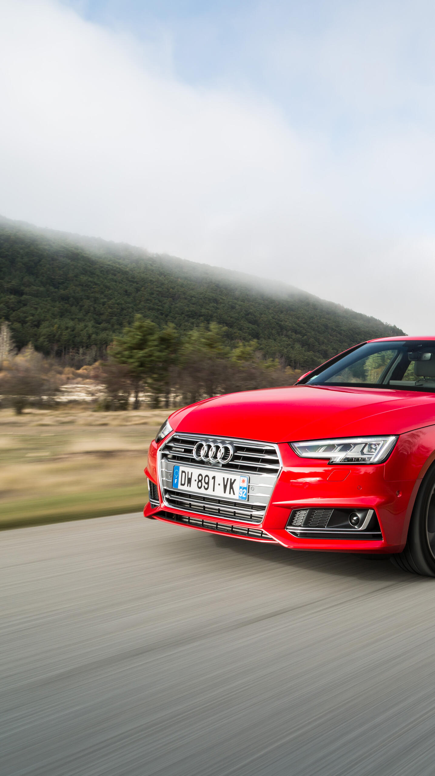 Wallpaper with red audi a4 quattro on the road · 1440x2560 QHD free photo from virtual and wallpaper