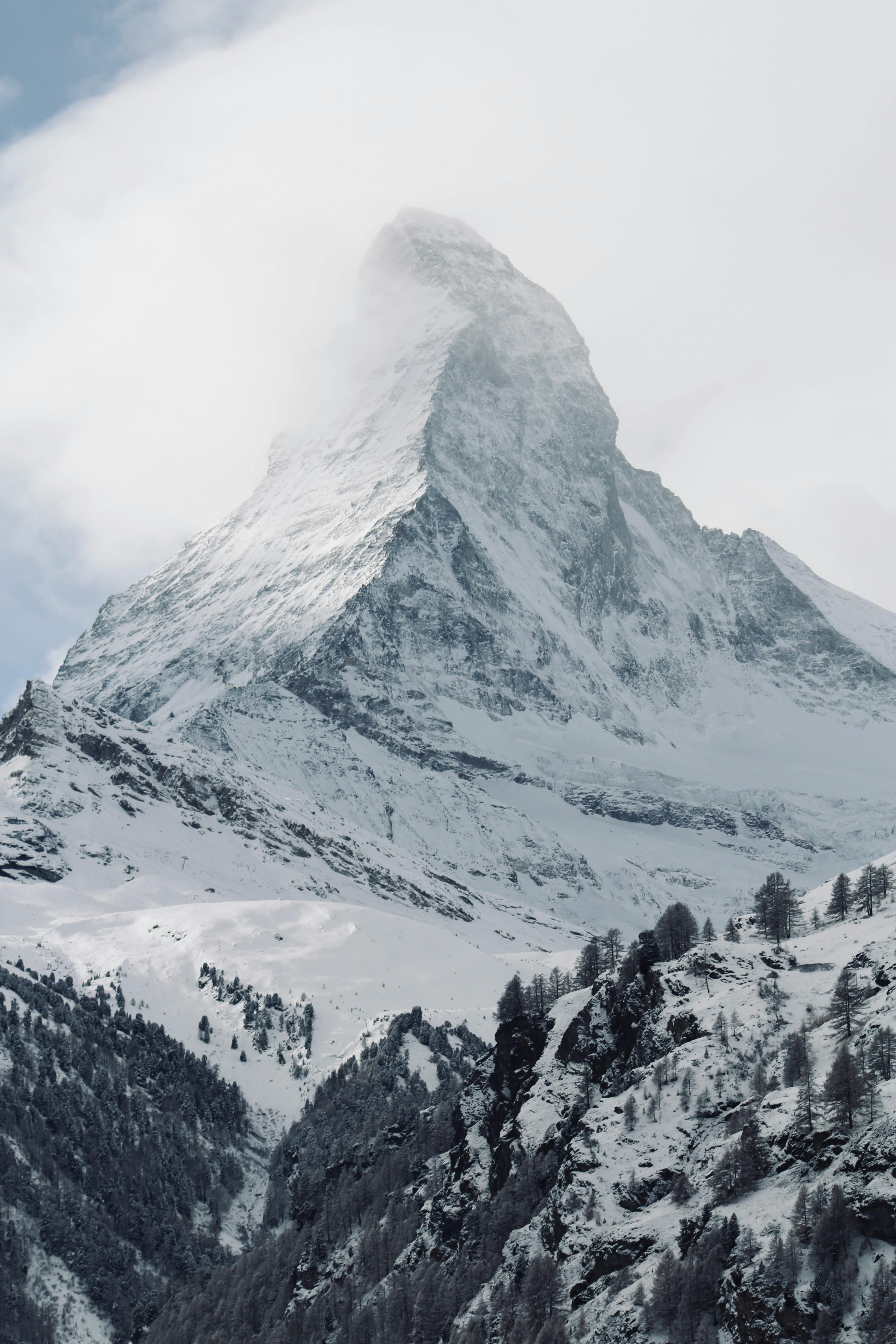 Matterhorn Peak in Alps Wrapped with Cloud in Winter Scenery · Free