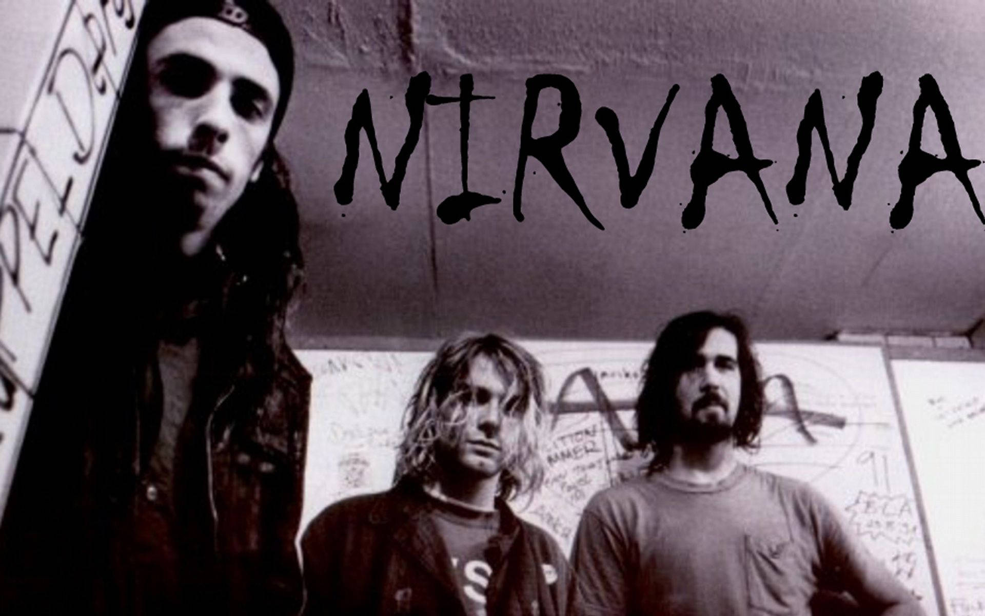 Download Nirvana Lead Vocalist And Drum Kit Members Wallpaper