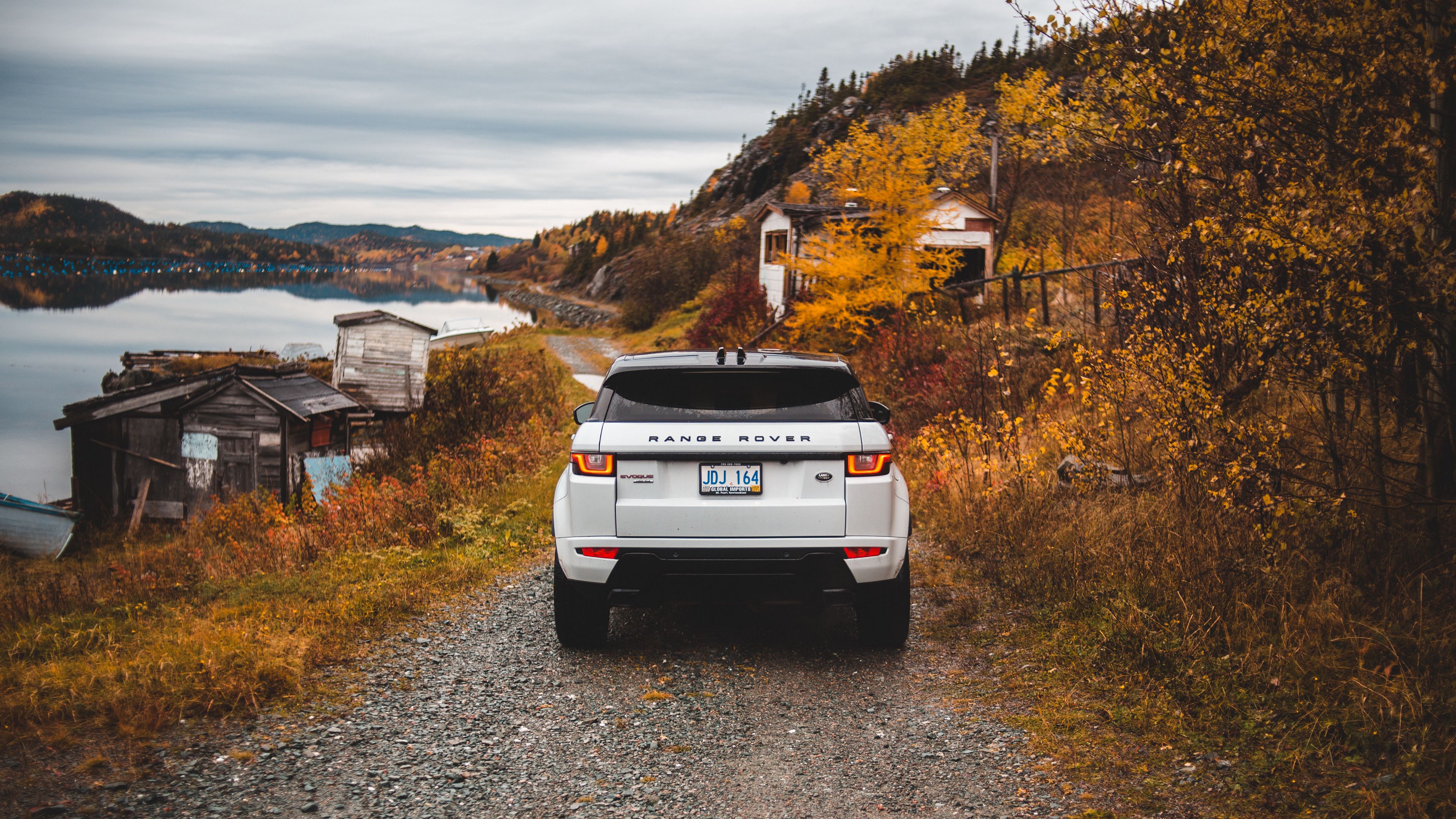 Download wallpaper 3840x2160 range rover, land rover, suv, autumn, rear view 4k uhd 16:9 HD background