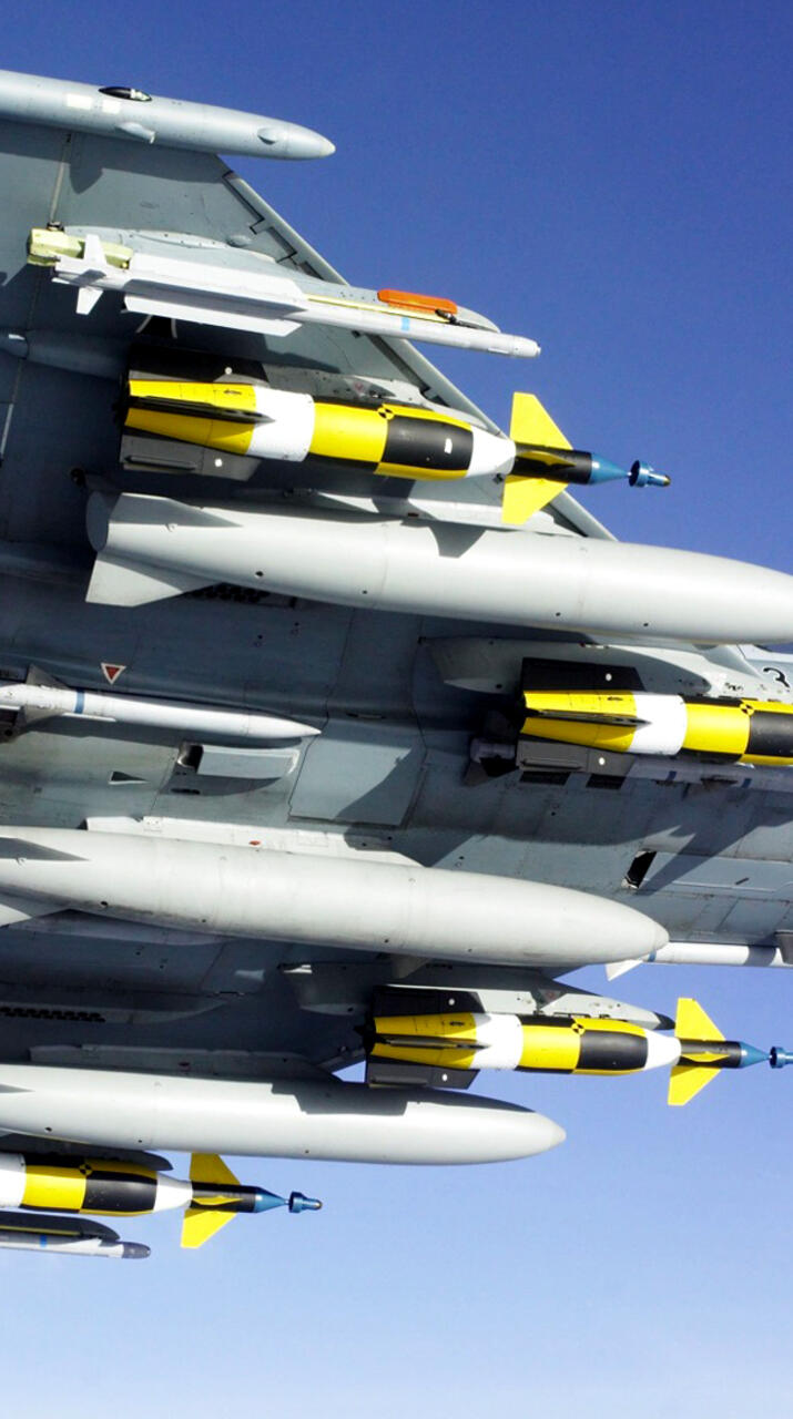 Eurofighter Typhoon in flight with full ammo · 720x1280 HD free photo from jorik and wallpaper