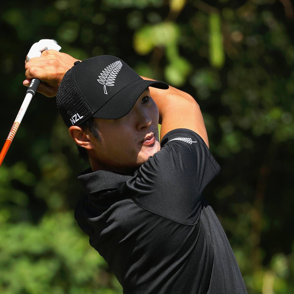 Download Caption: Danny Lee Exhibiting Perfect Golfing Posture Wallpaper