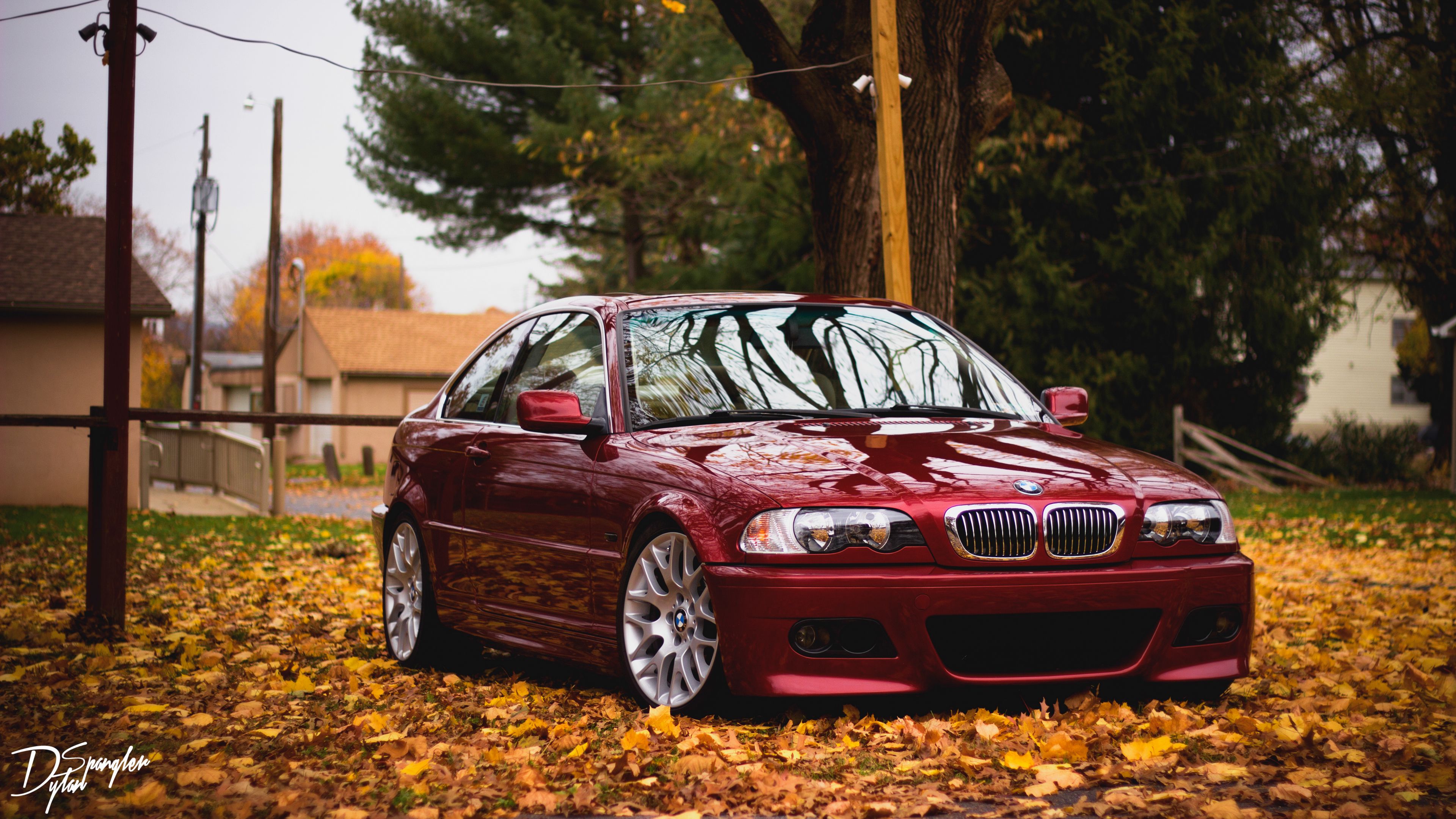 Download wallpaper 3840x2160 bmw, red, side view, foliage, autumn 4k uhd 16:9 HD background