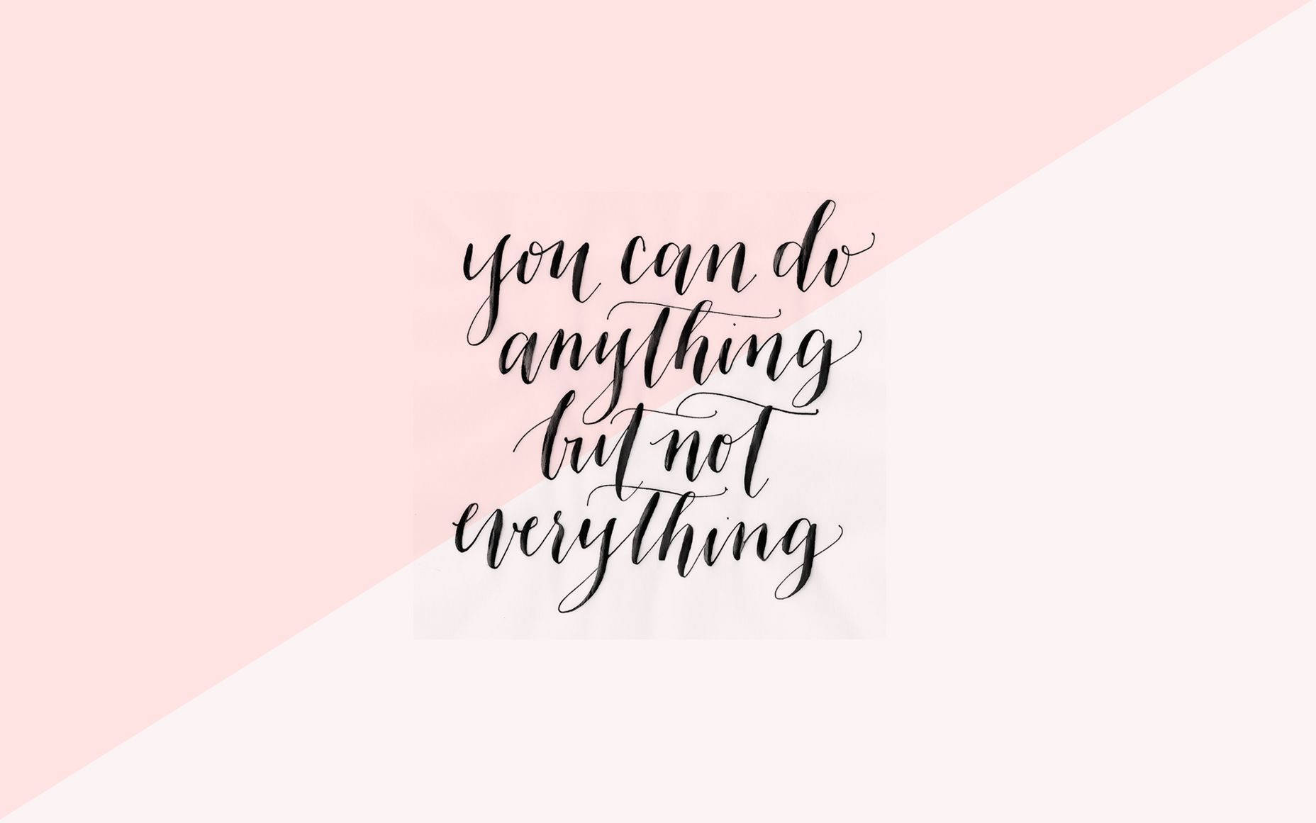 Download A Sleek, Modern Laptop With Motivational Quote As Its Wallpaper In A Cozy Workspace. Wallpaper