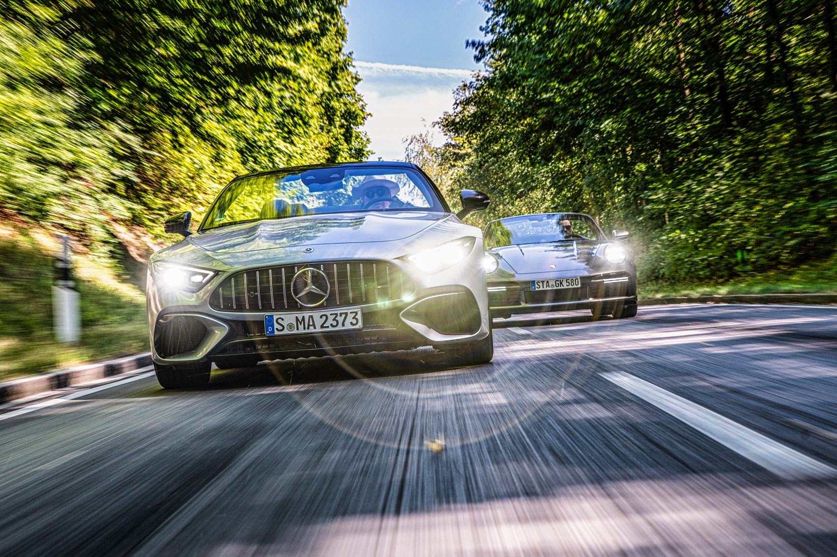 Mercedes AMG SL63 Vs Porsche 911 Turbo Cabriolet Twin Test Review