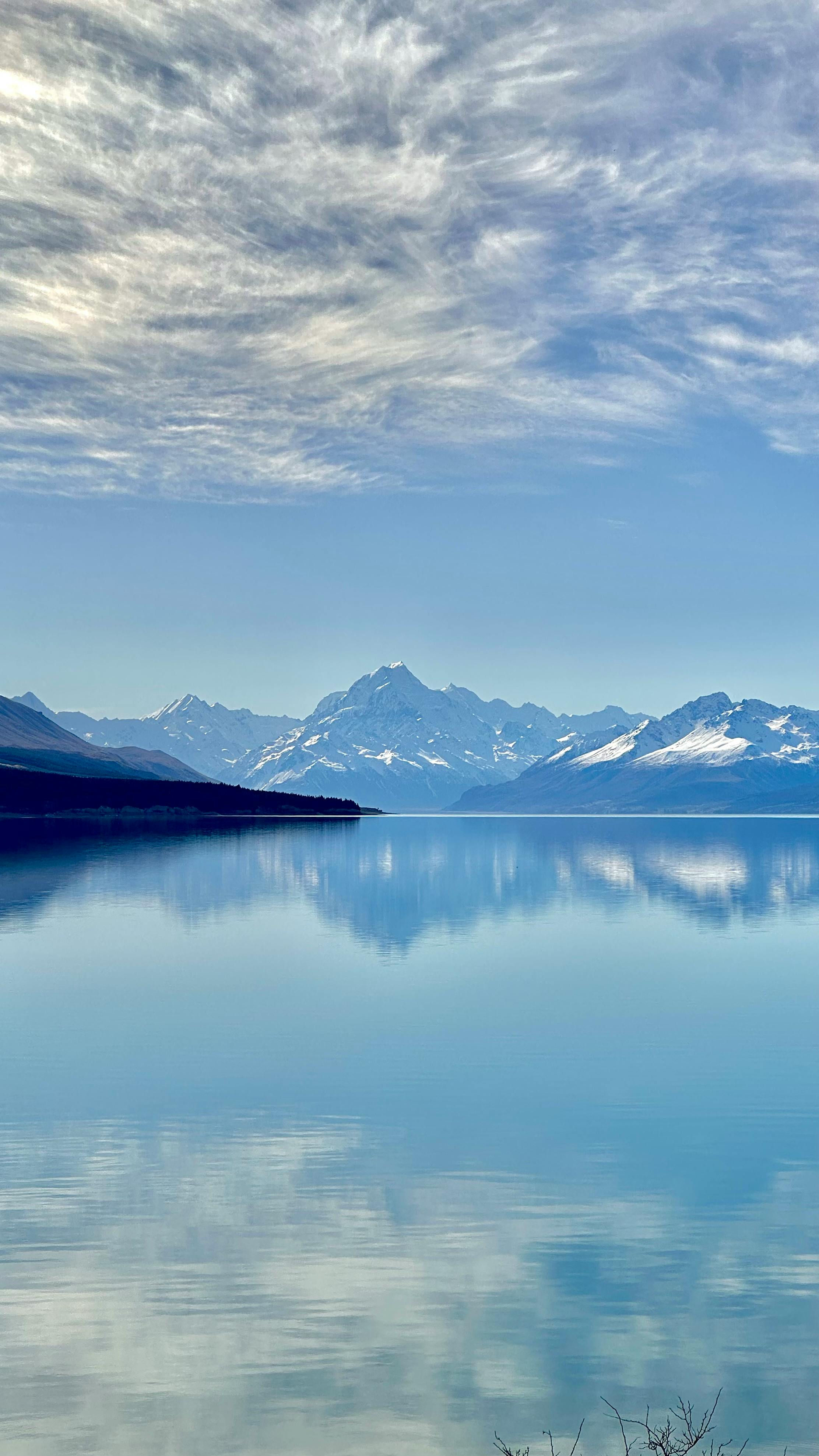 Sky Reflecting in a Placid Alpine Lake · Free