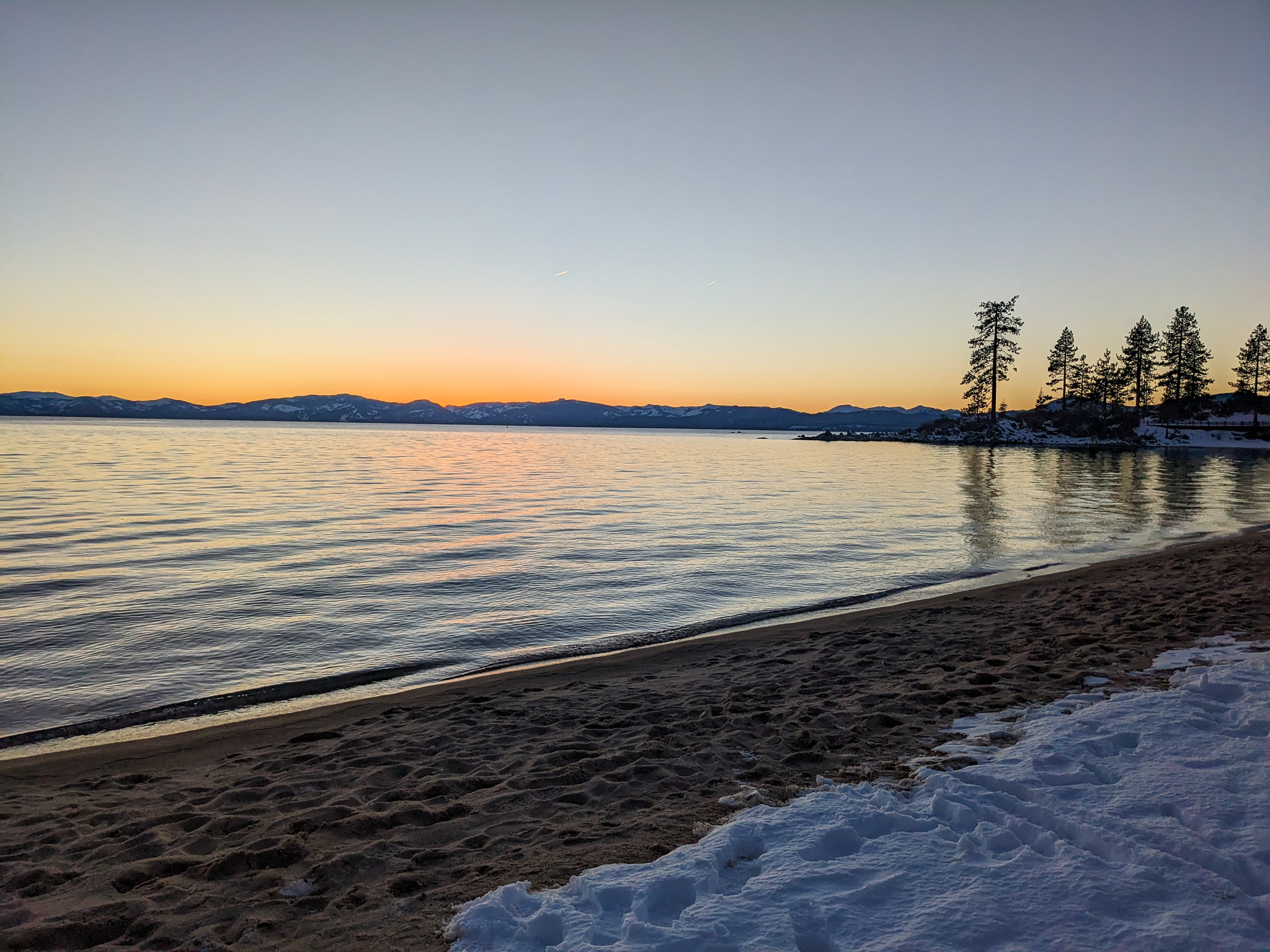 Lake Tahoe, CA Backcountry Report: Sunset Skiing Above a Shimmering Lake Tahoe in Orange & Pink Light