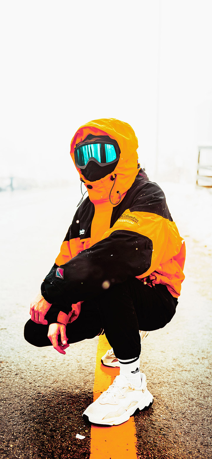 Person In A Yellow Hoodie 4K Phone Wallpaper