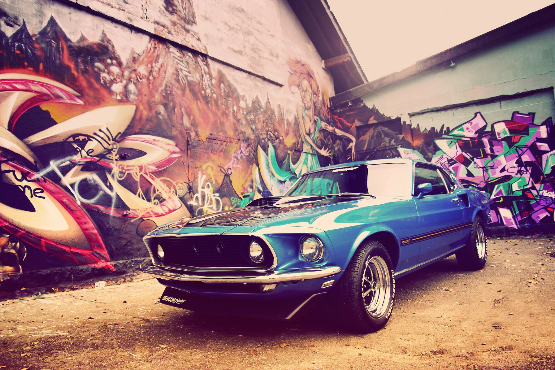 Ford Mustang 1969 among graffiti for your phone