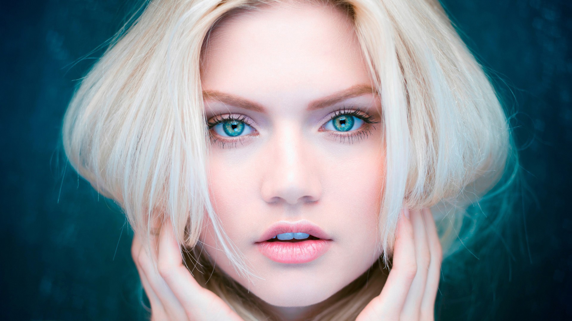 Stunning Blonde Model with Piercing Blue Eyes