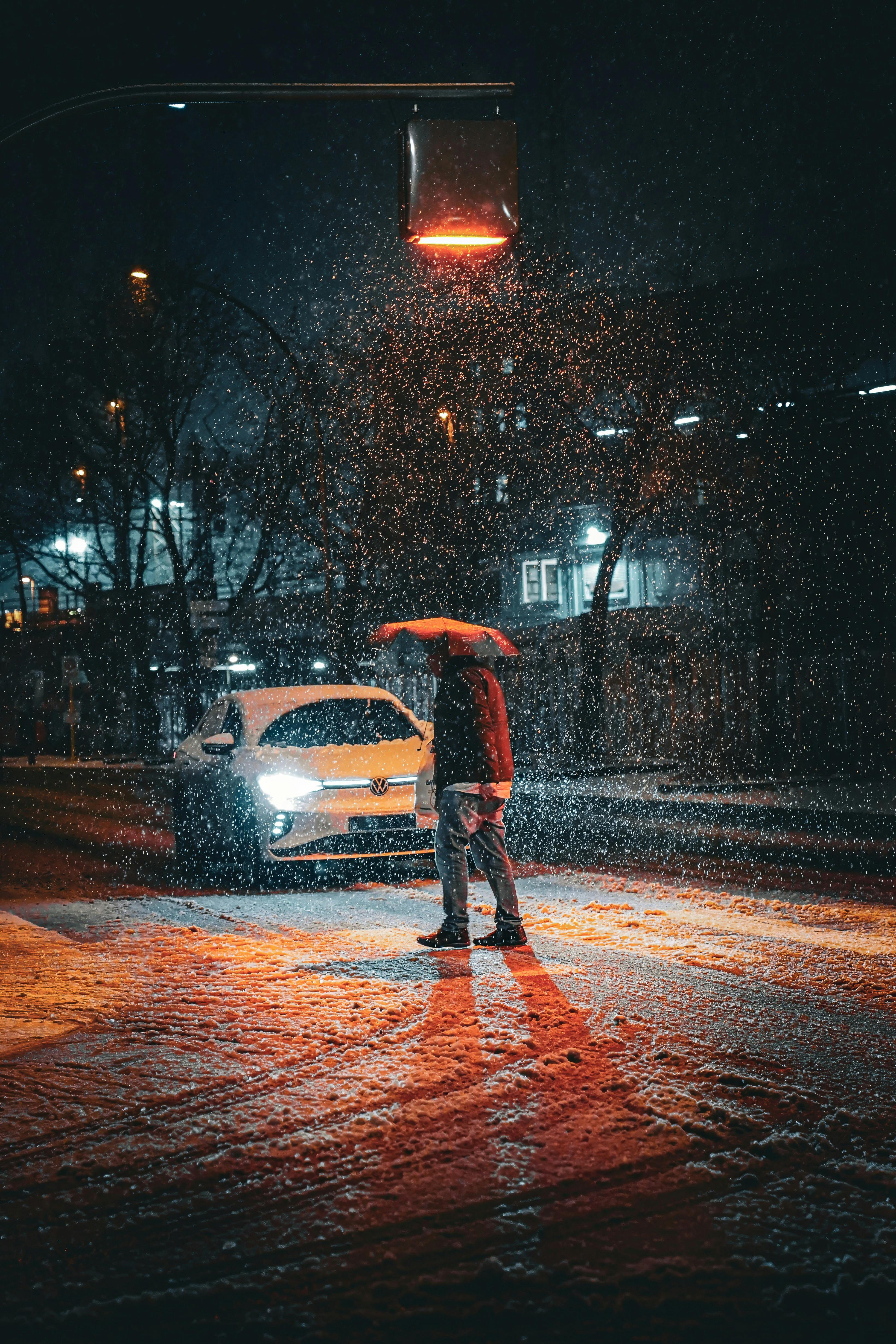 Winter Night Street Scene with Falling Snow in Berlin · Free